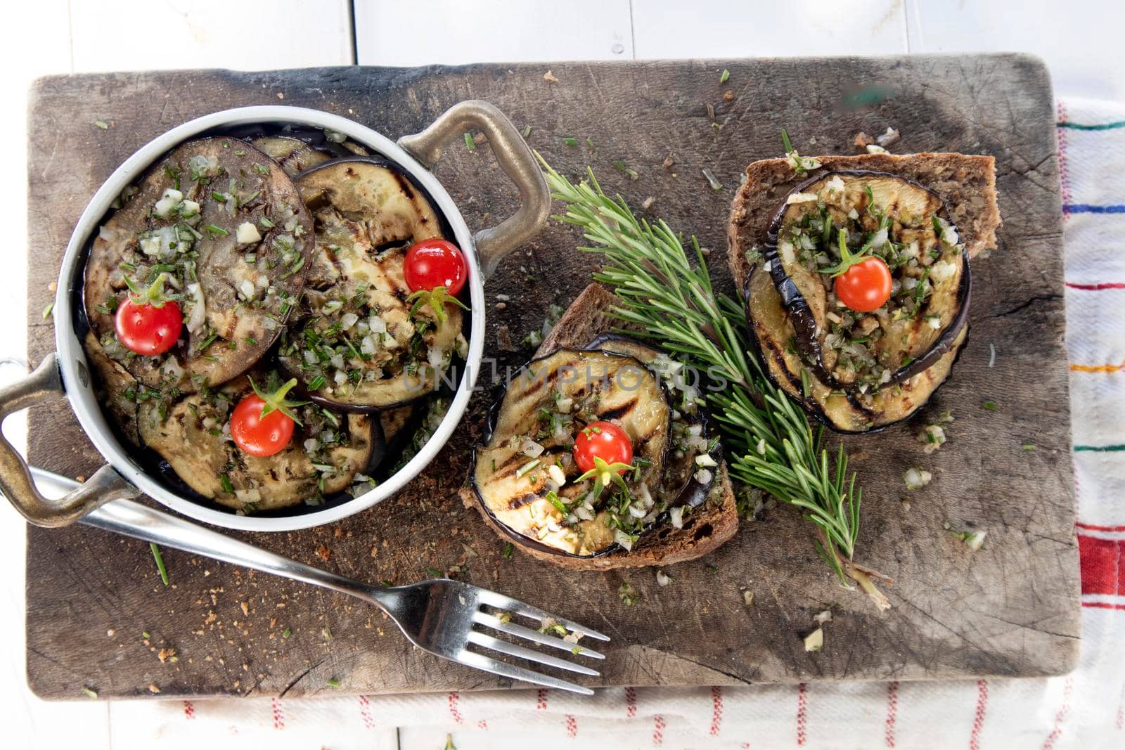 Bruschetta with grilled aubergine and Pachino tomatoes by fotografiche.eu