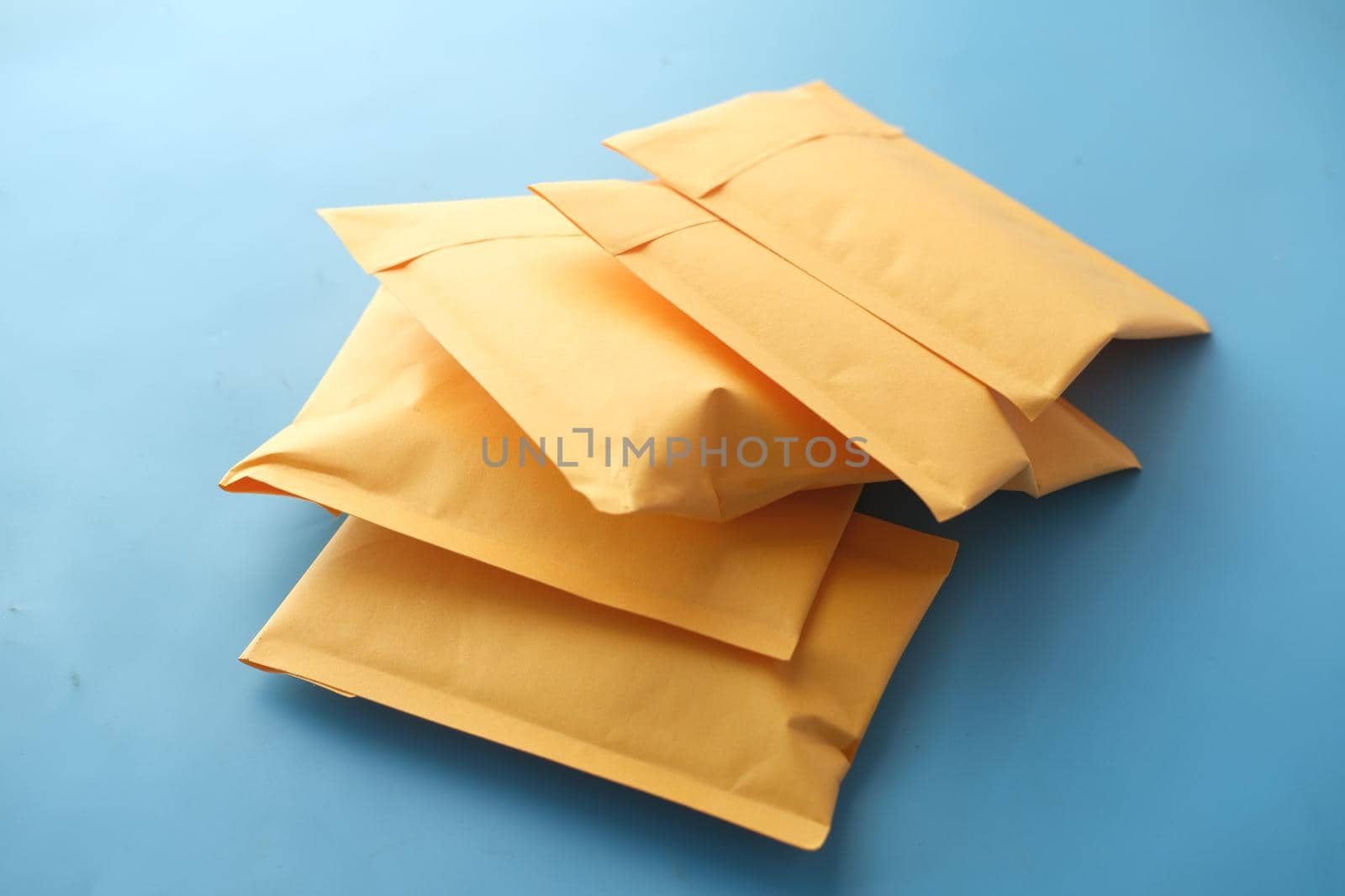 yellow paper bubble envelope on table ,