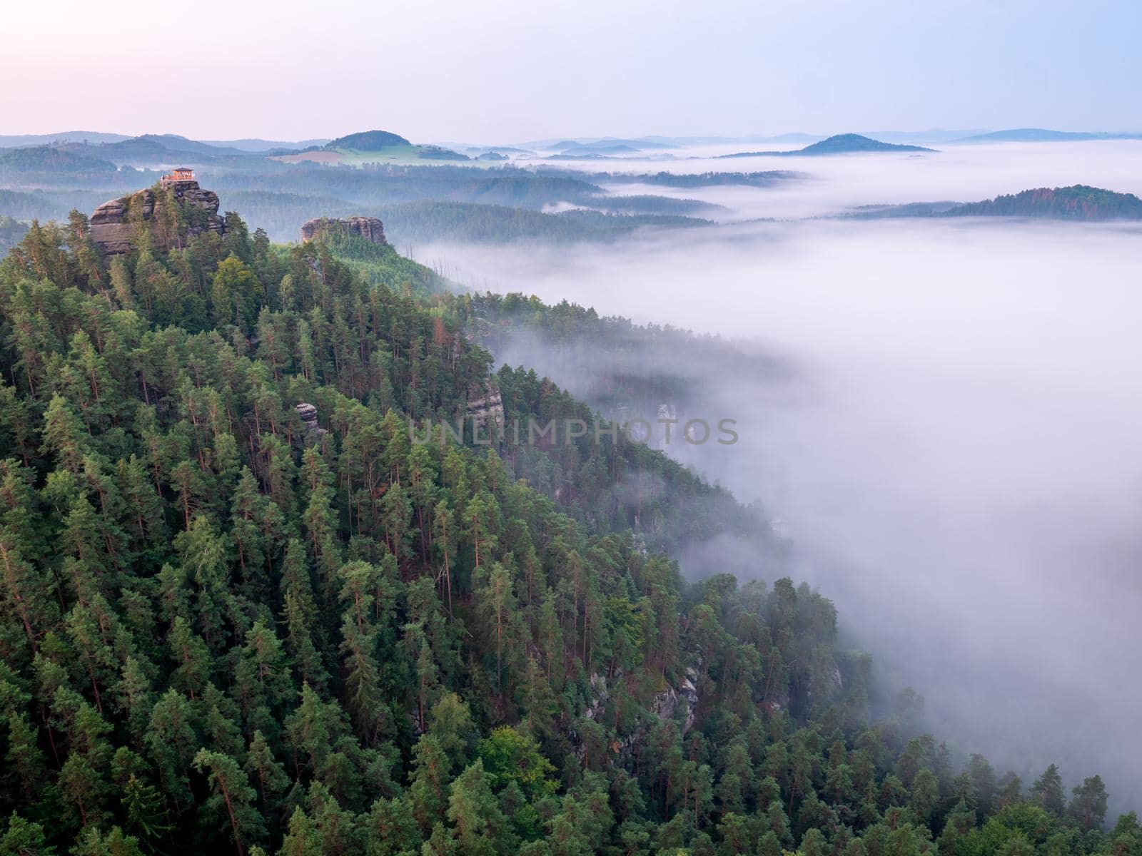 Morning view to misty Swiss Bohemian landscape during sunrise. Morning mist by rdonar2