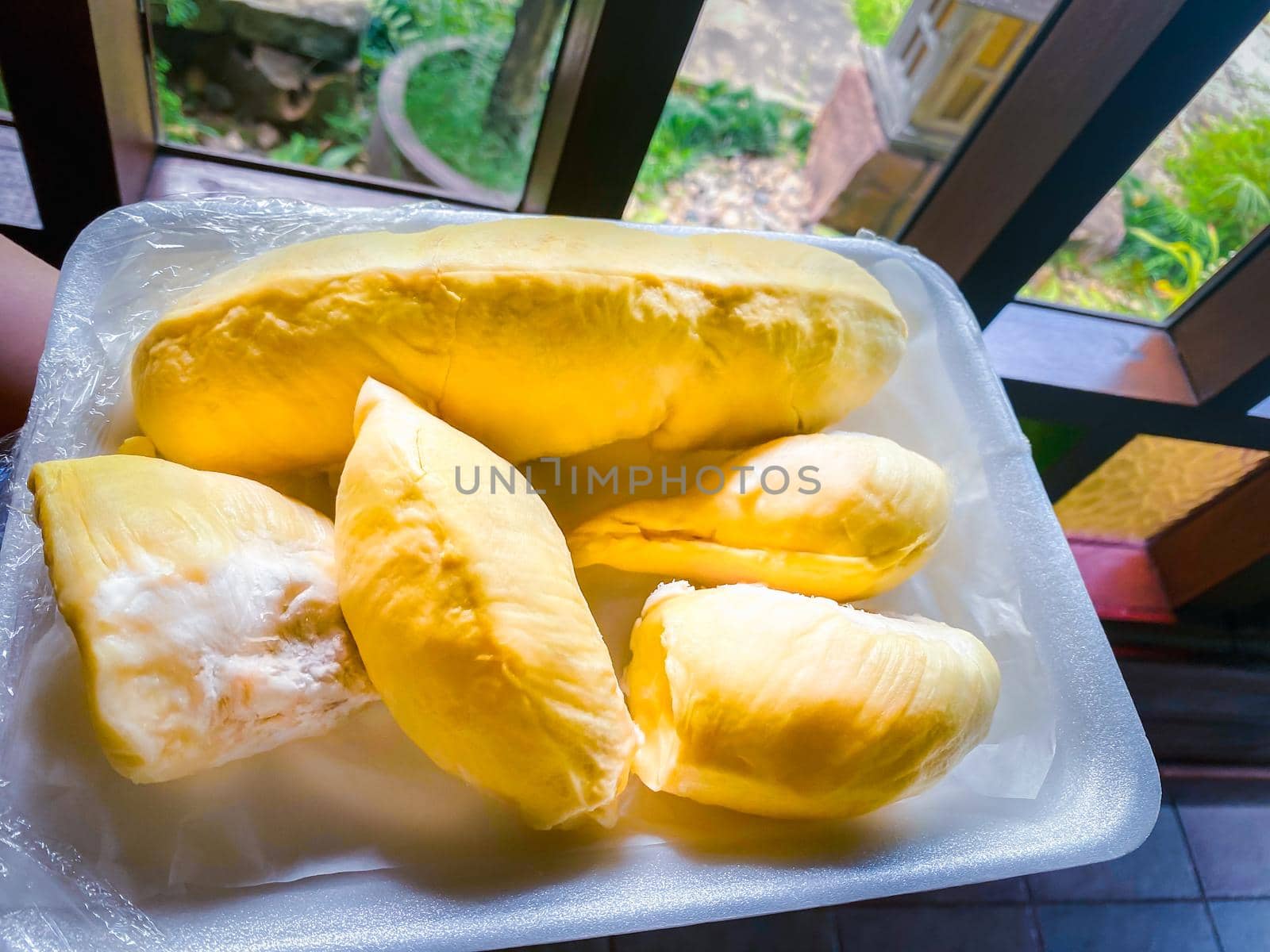 Durian is a king of fruit in Thailand and asia fruit have a spikes shell and sweet can buy at Thai street food and fruit market at agriculture farm