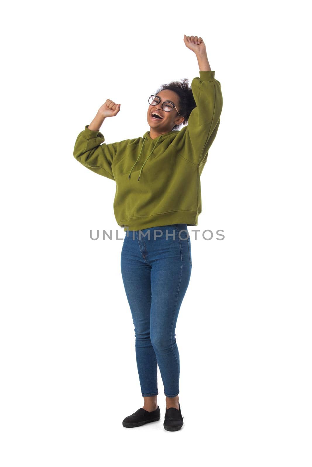 Black woman wearing casual clothes cheering with arms stretched screaming of joy full length portrait isolated over a white background