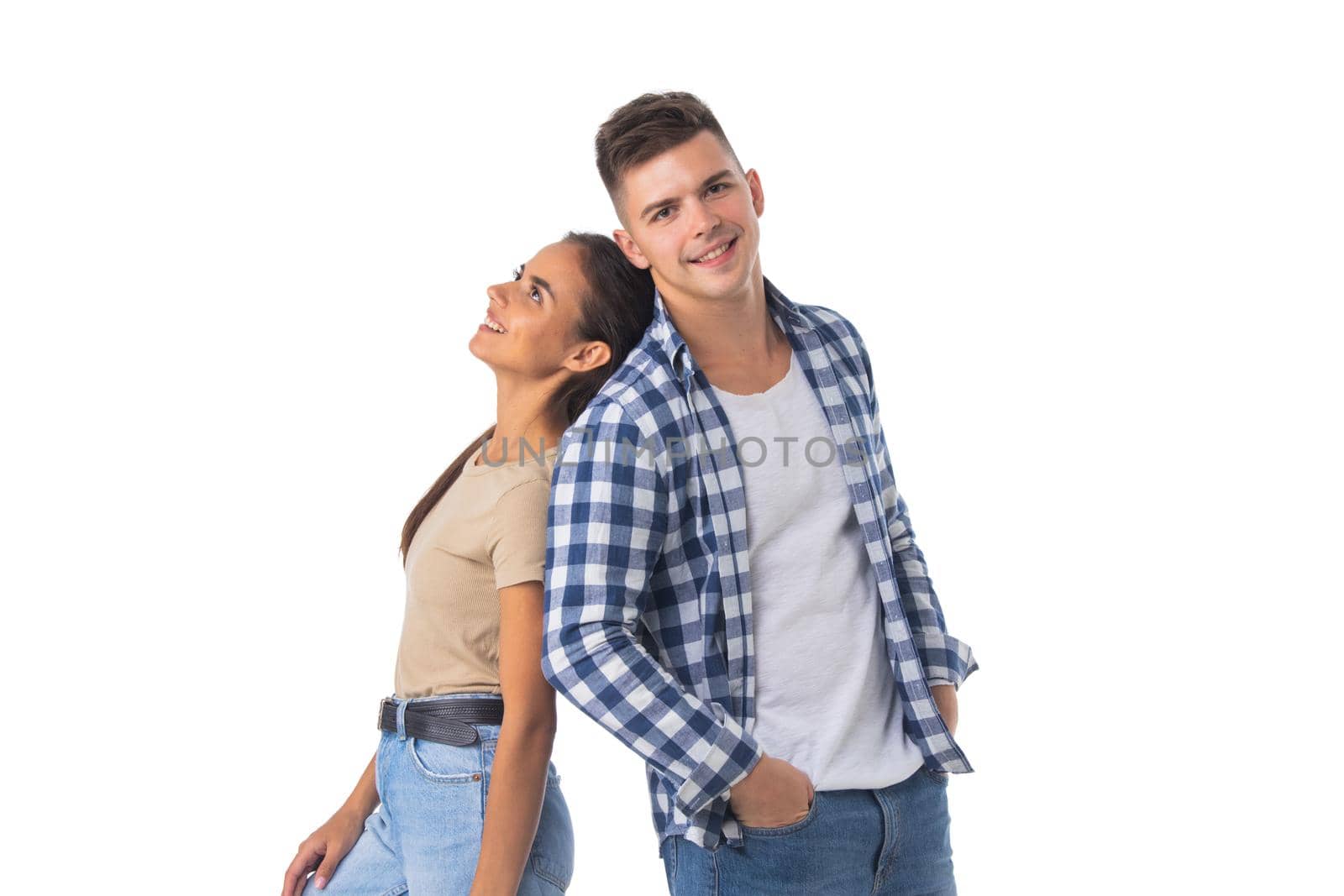 Happy couple standing back isolated on white background