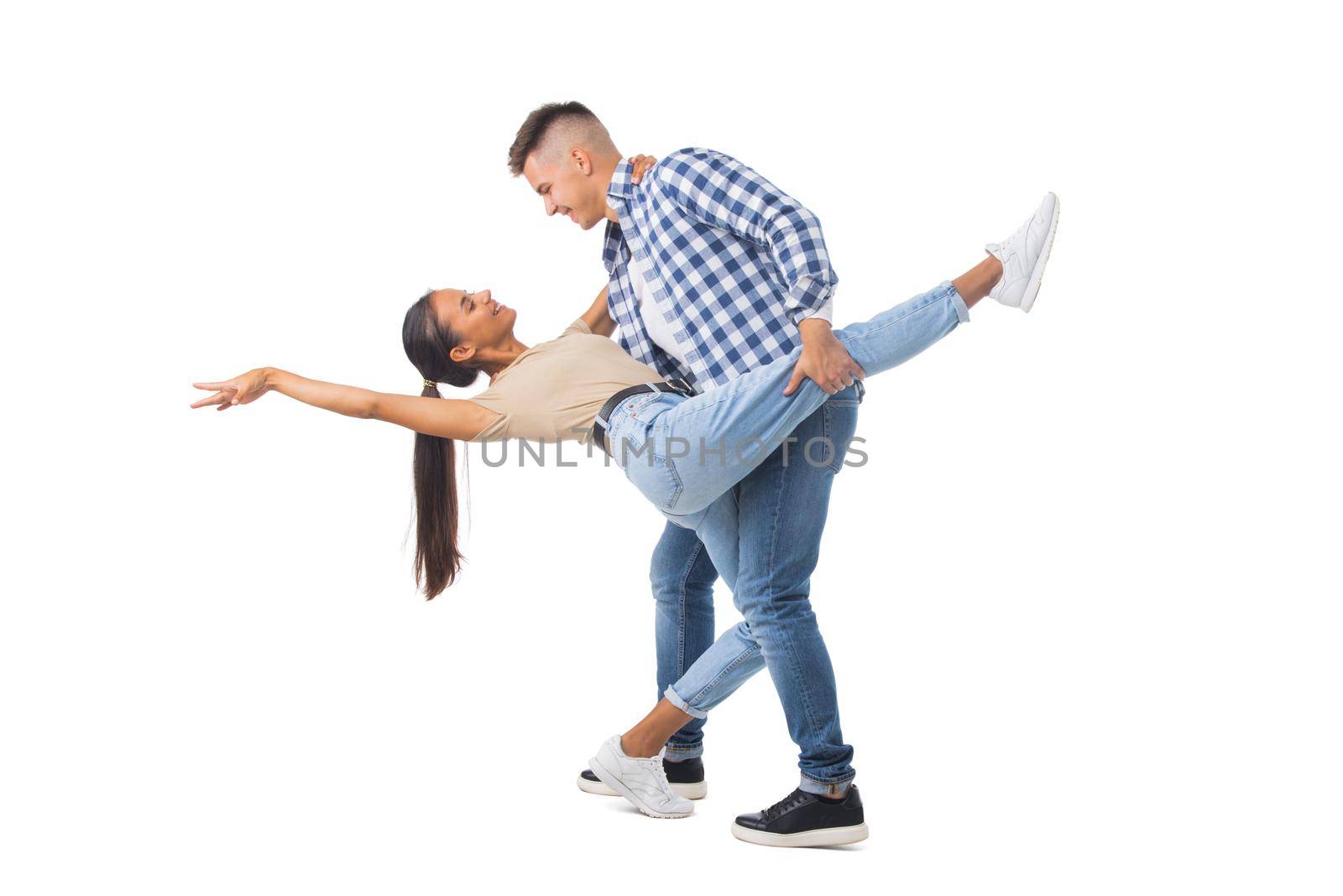 Young couple dancing on white by ALotOfPeople