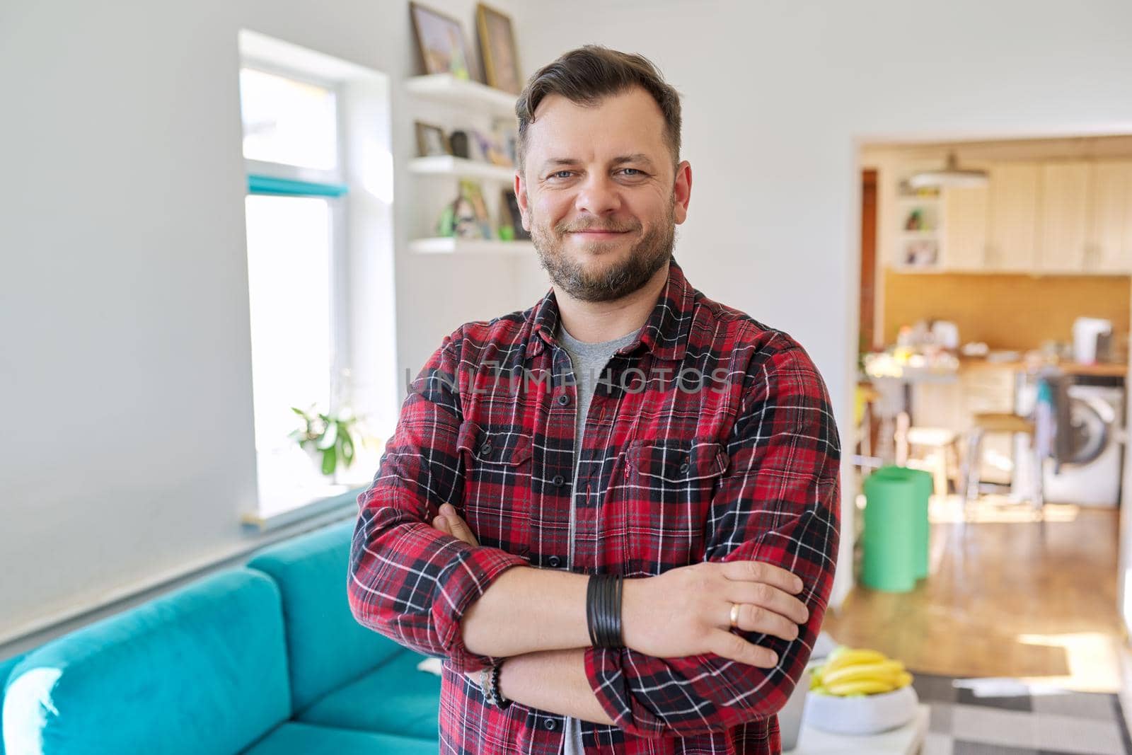 Portrait of confident middle aged man, smiling male looking at camera with crossed arms by VH-studio