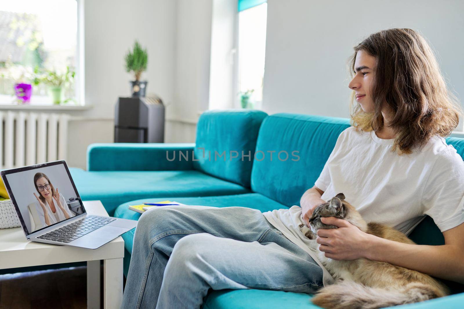Guy teen talking online with teacher, psychologist, social worker by VH-studio