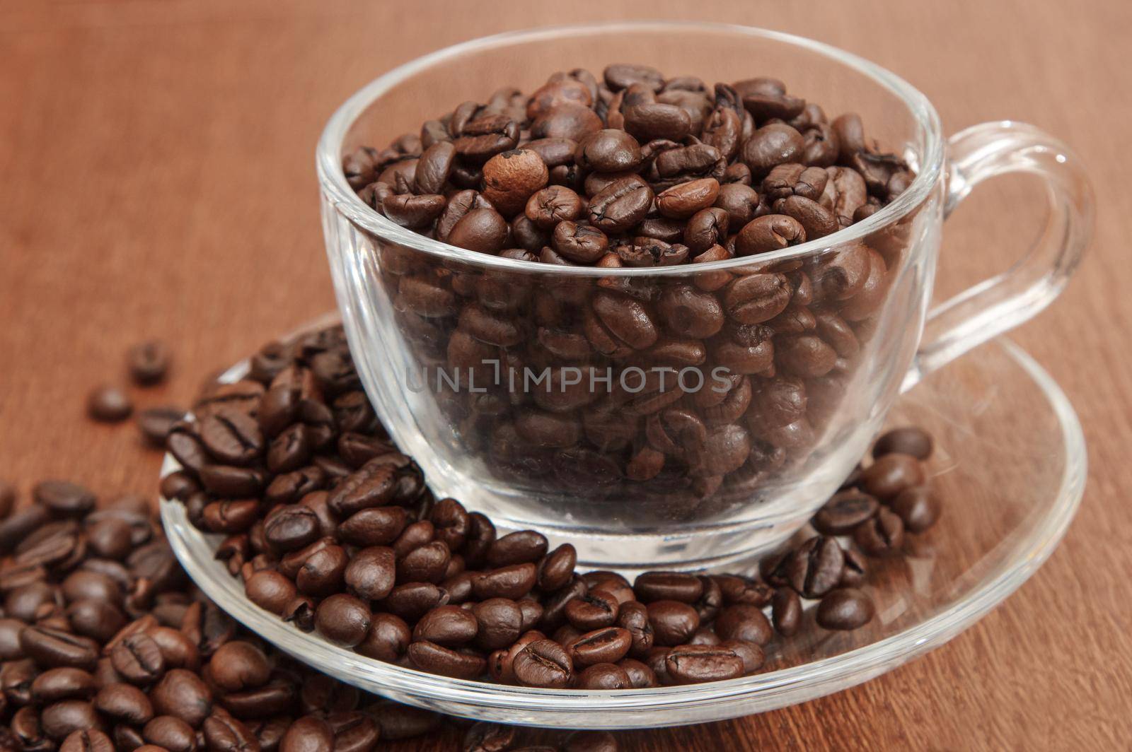 coffee beans in a cup by raddnatt
