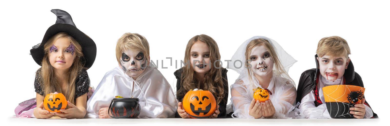 Children in Halloween costume on white by Yellowj