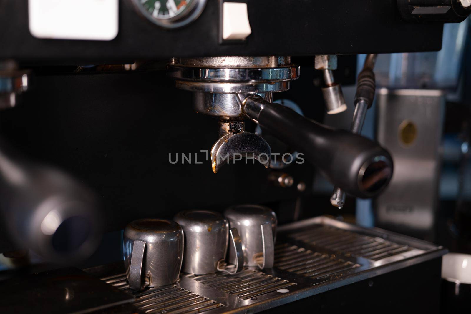 details of dark loft coffee shop. professional coffee machine close up.