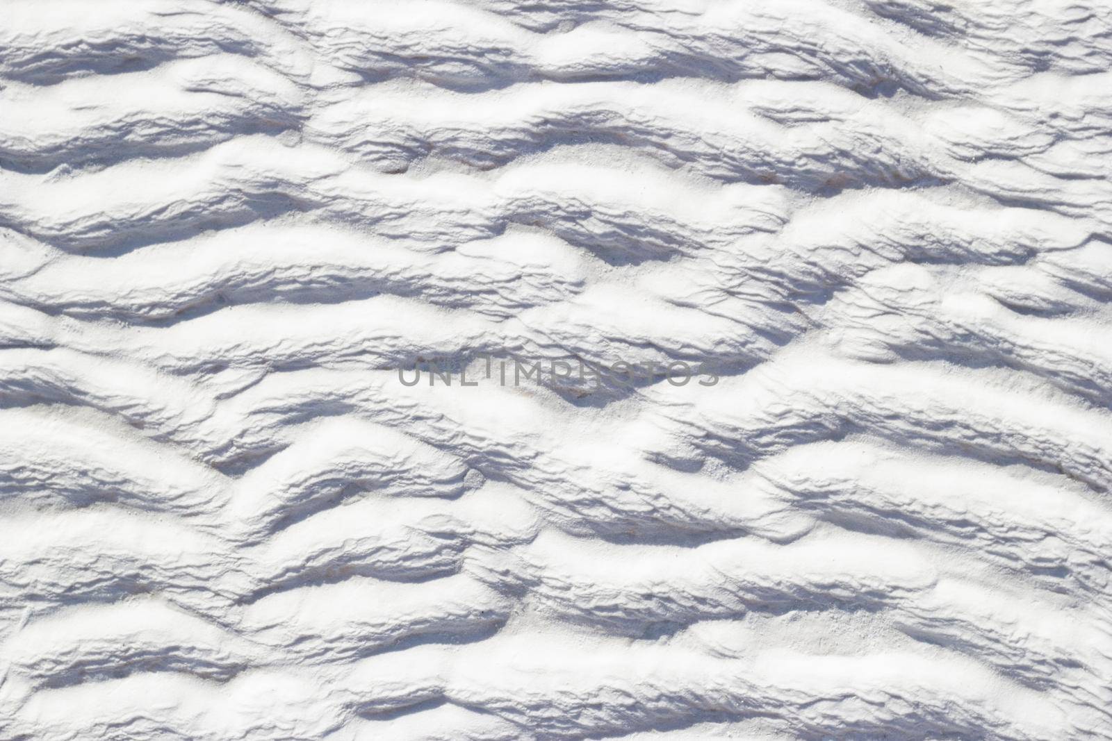 Texture of Pamukkale calcium travertine, white pattern of horizontal waves by Laguna781