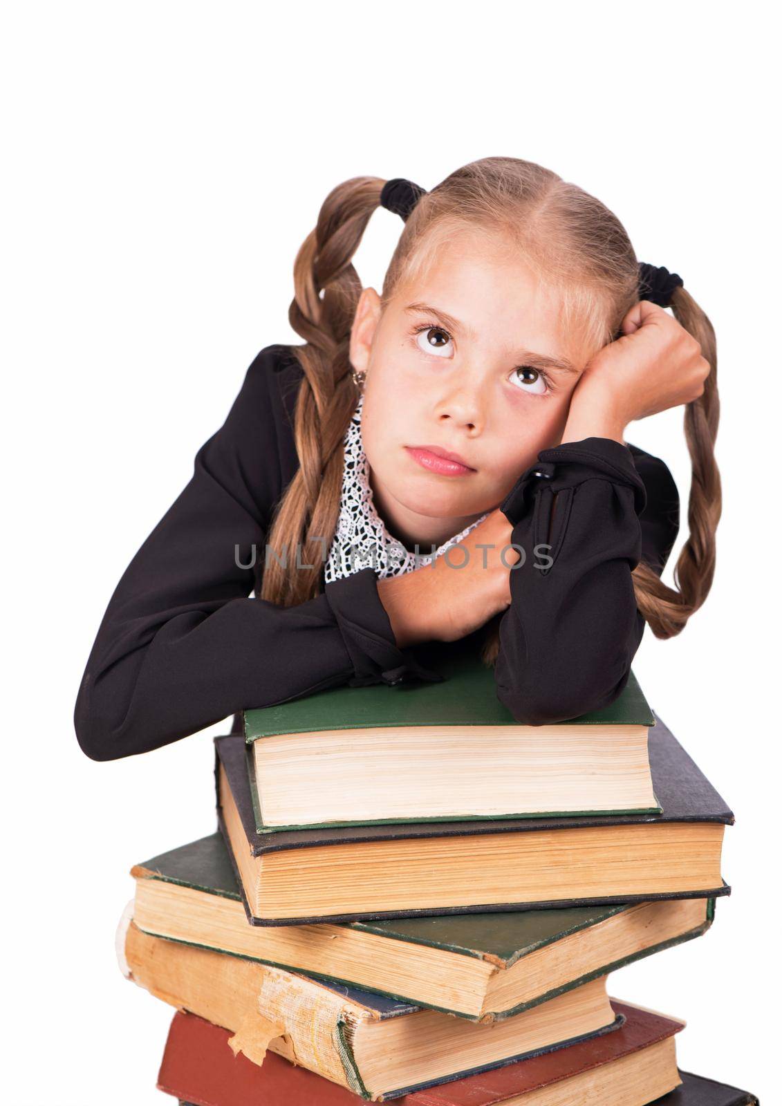 schoolgirl with books and school supplies isolated on white background.