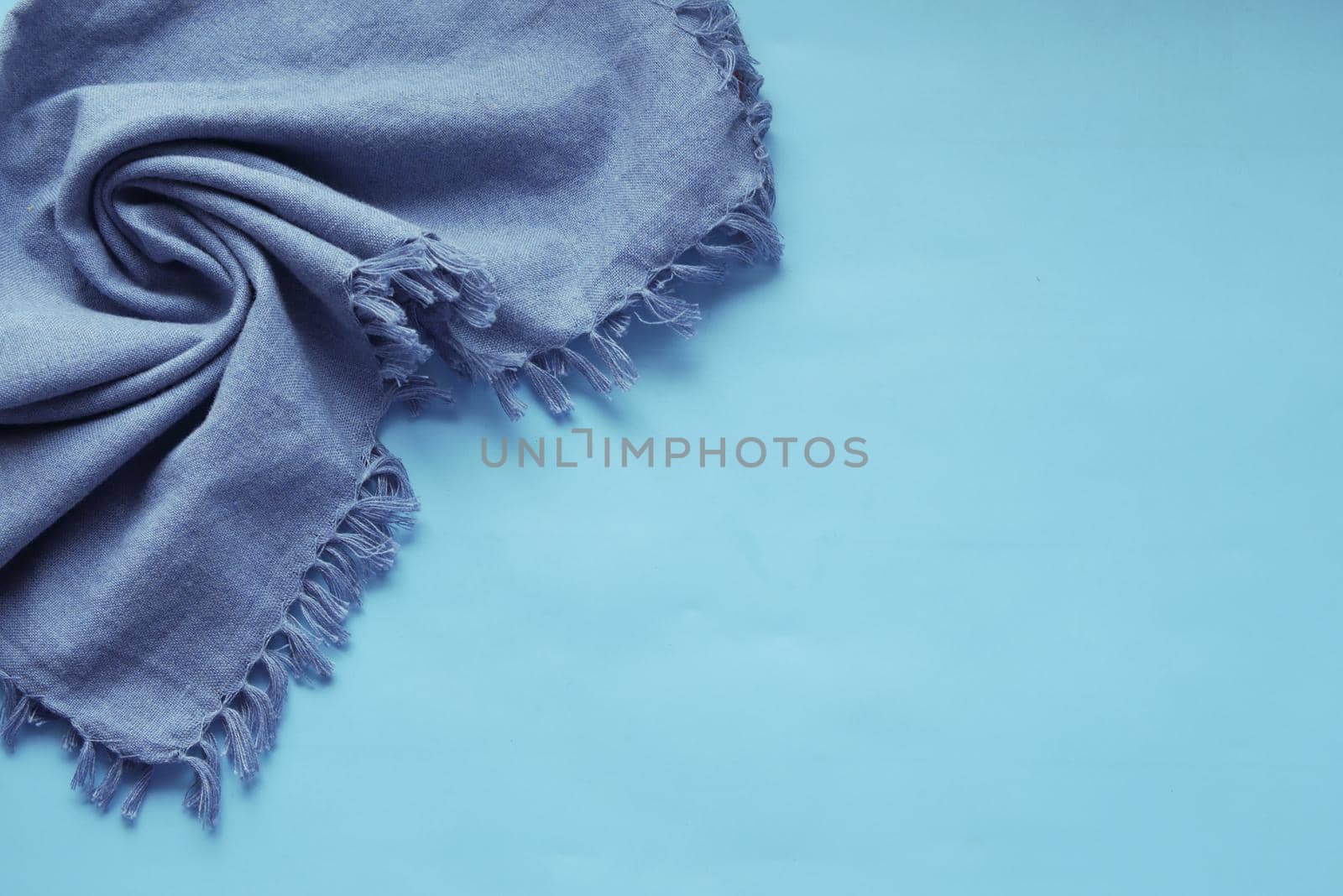 blue color table napkin on blue background ,