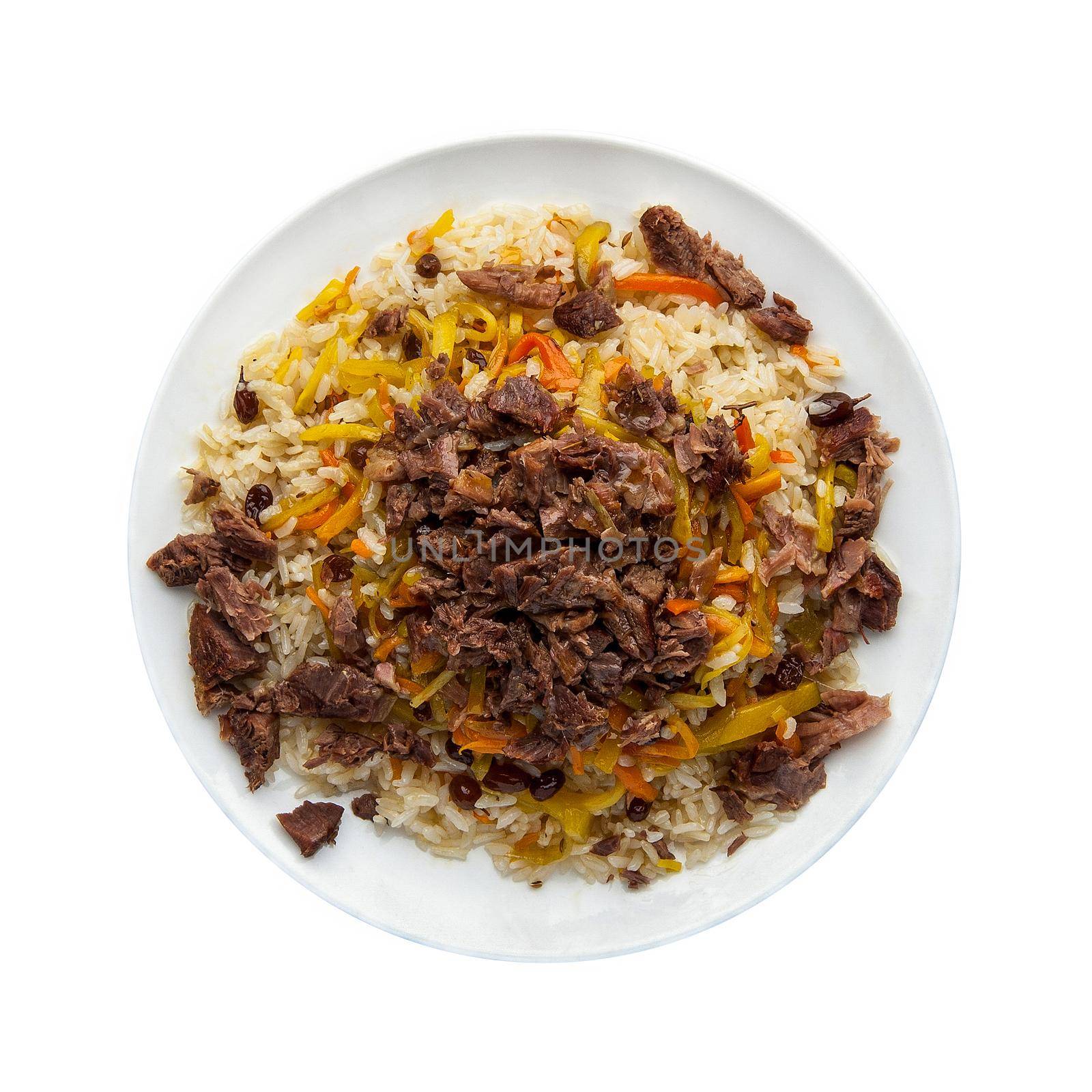 Traditional oriental pilaf with meat in a plate on a white background. Top view. Isolated