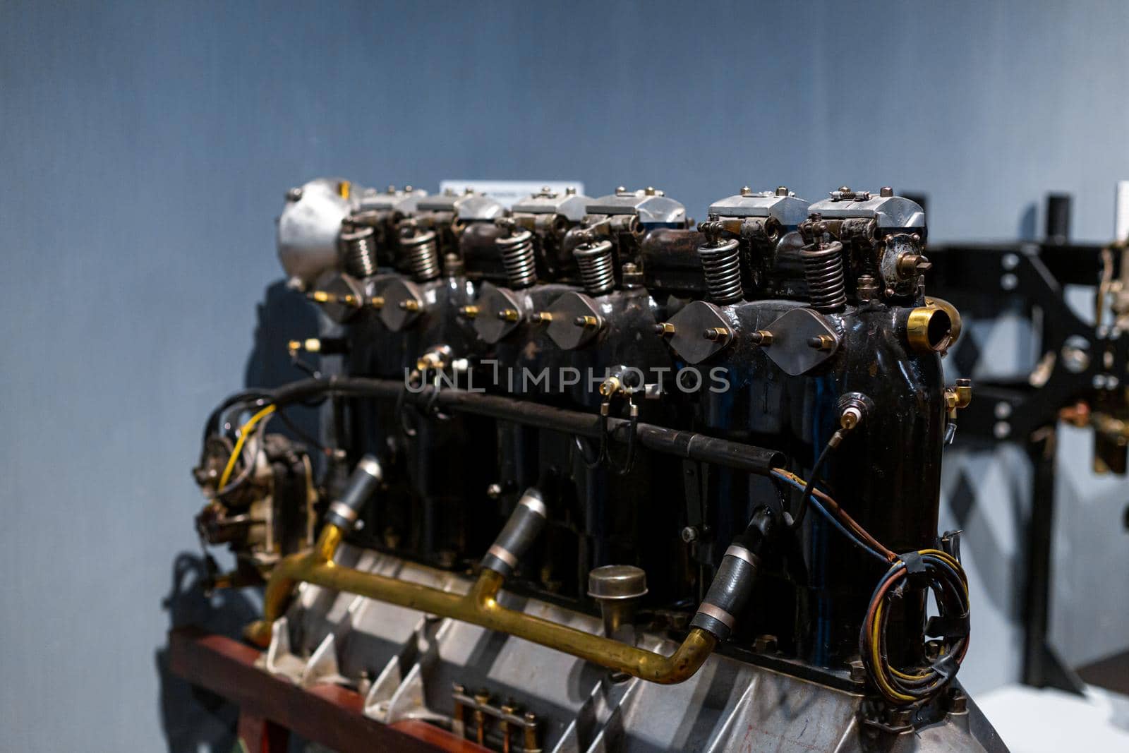 Close-up of a detail of a rare car engine. Metal mechanisms. Automotive industry by Try_my_best