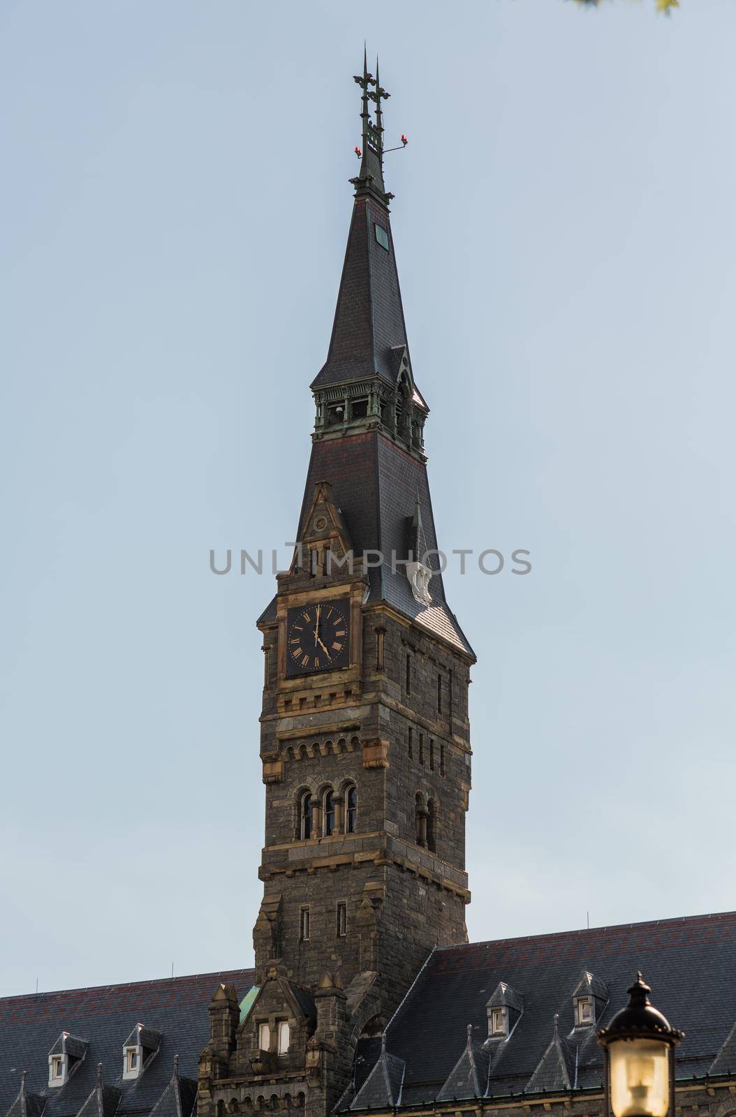 Clock tower of Healy Hall historic flagship building of Georgetown University in Washington DC. Built in 1879 by Paul Pelz and John Smithmeyer.