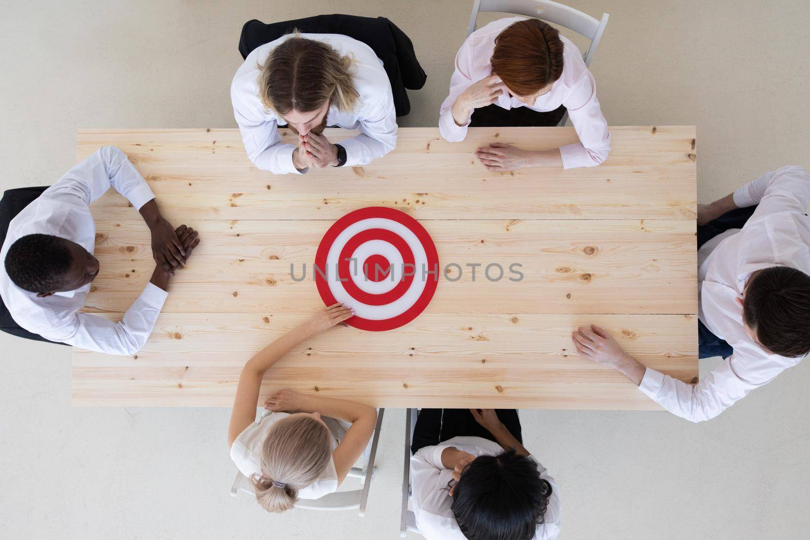 Goal Target Success Aspiration Aim Inspiration Concept, business people team sitting around meeting office table