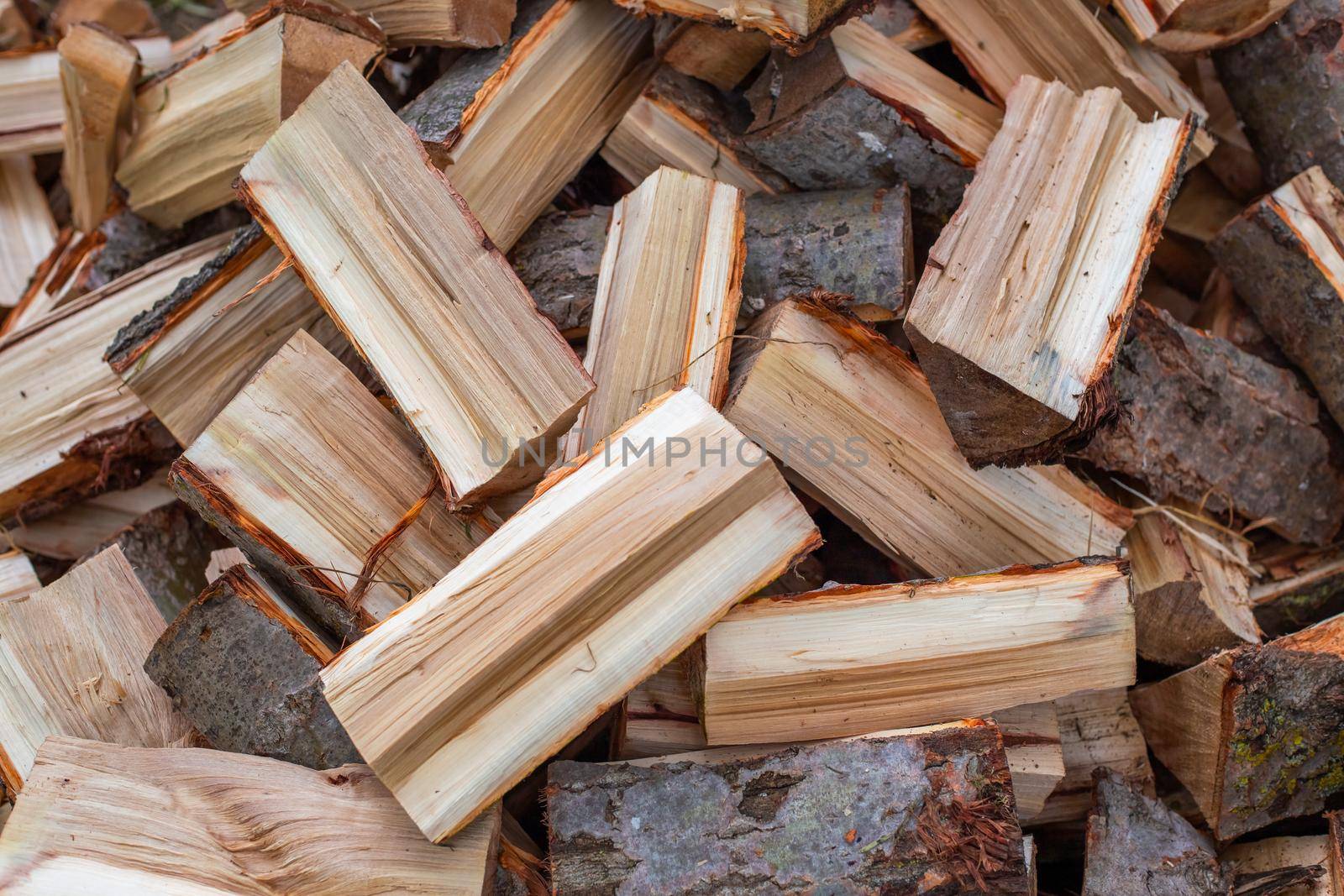 Chopped pine firewood. Fuel preparation for boilers and furnaces.