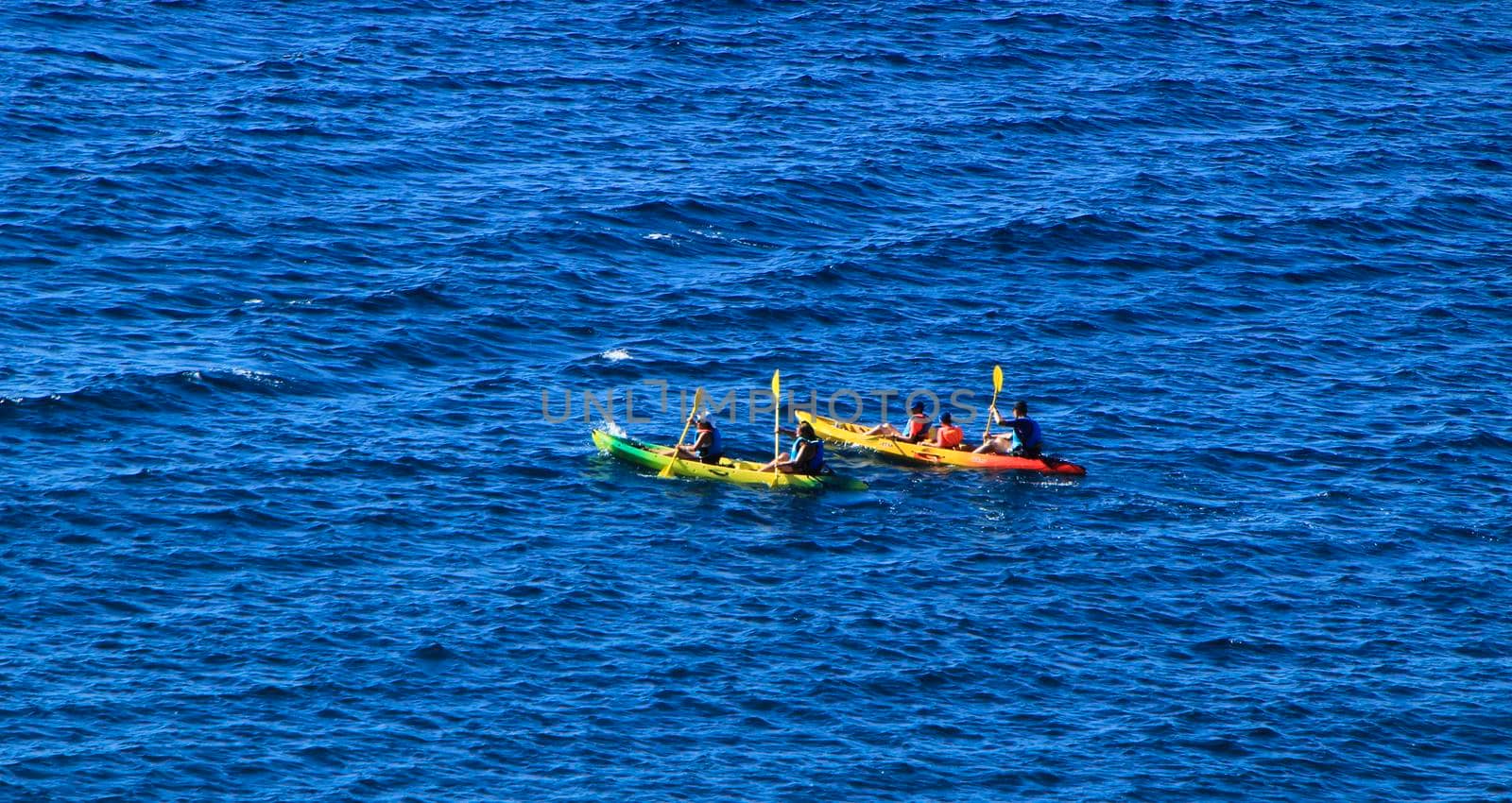 Cabo de Gata, Almeria, Spain- September 3, 2021:People practicing canoeing in the Reef of the Sirens in Cabo de Gata, Almeria, Spain.