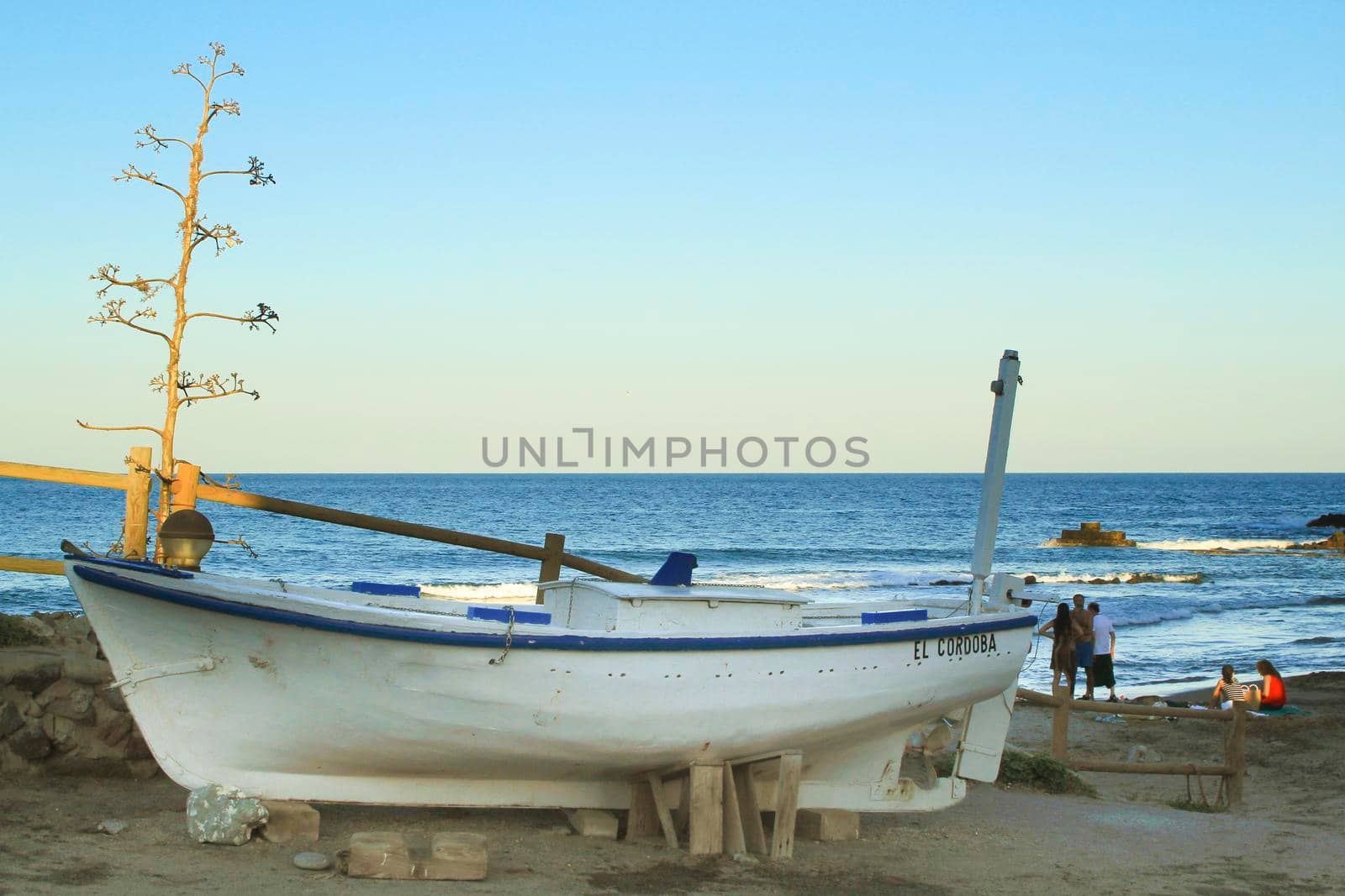 Isleta del Moro, Almeria, Spain- September 2, 2021:Fishing boat on the shore in Isleta del Moro village, Cabo de Gata, Almeria, Spain
