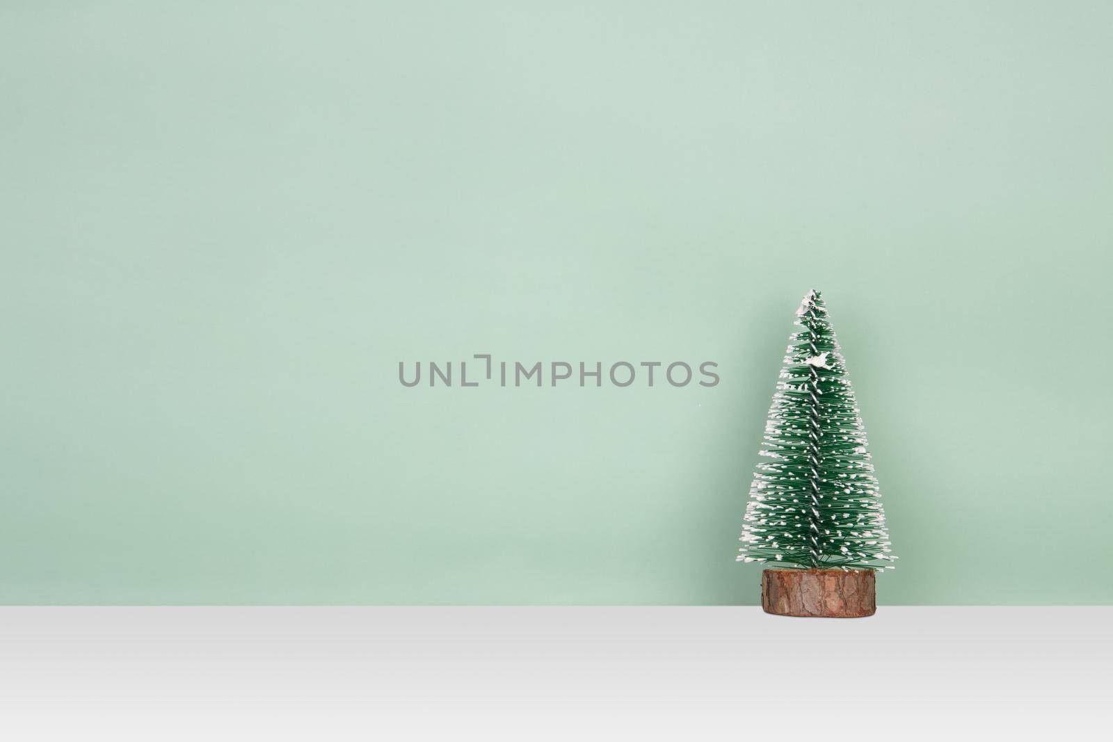 Christmas tree in holiday for decoration on desk, ornament for merry Christmas on table, xmas and festive for celebration, copy space, season and event.