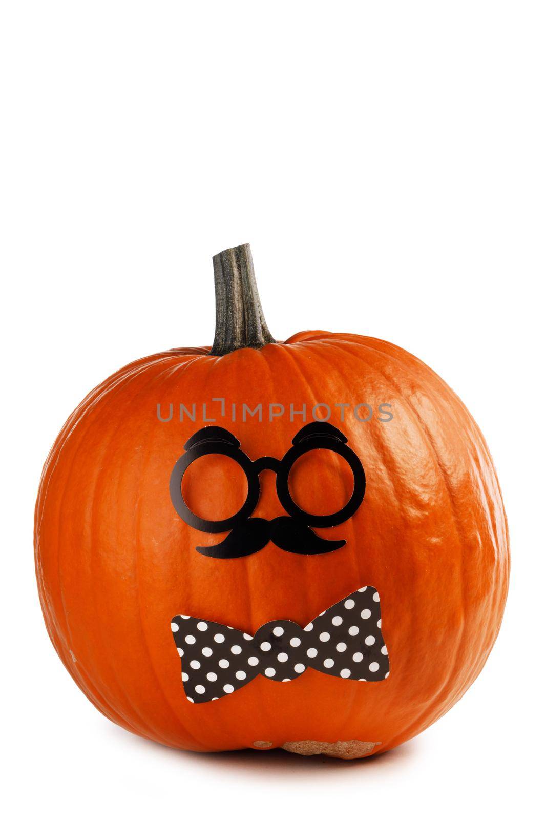 Funny halloween pumpkin in glasses and mustache isolated on white background
