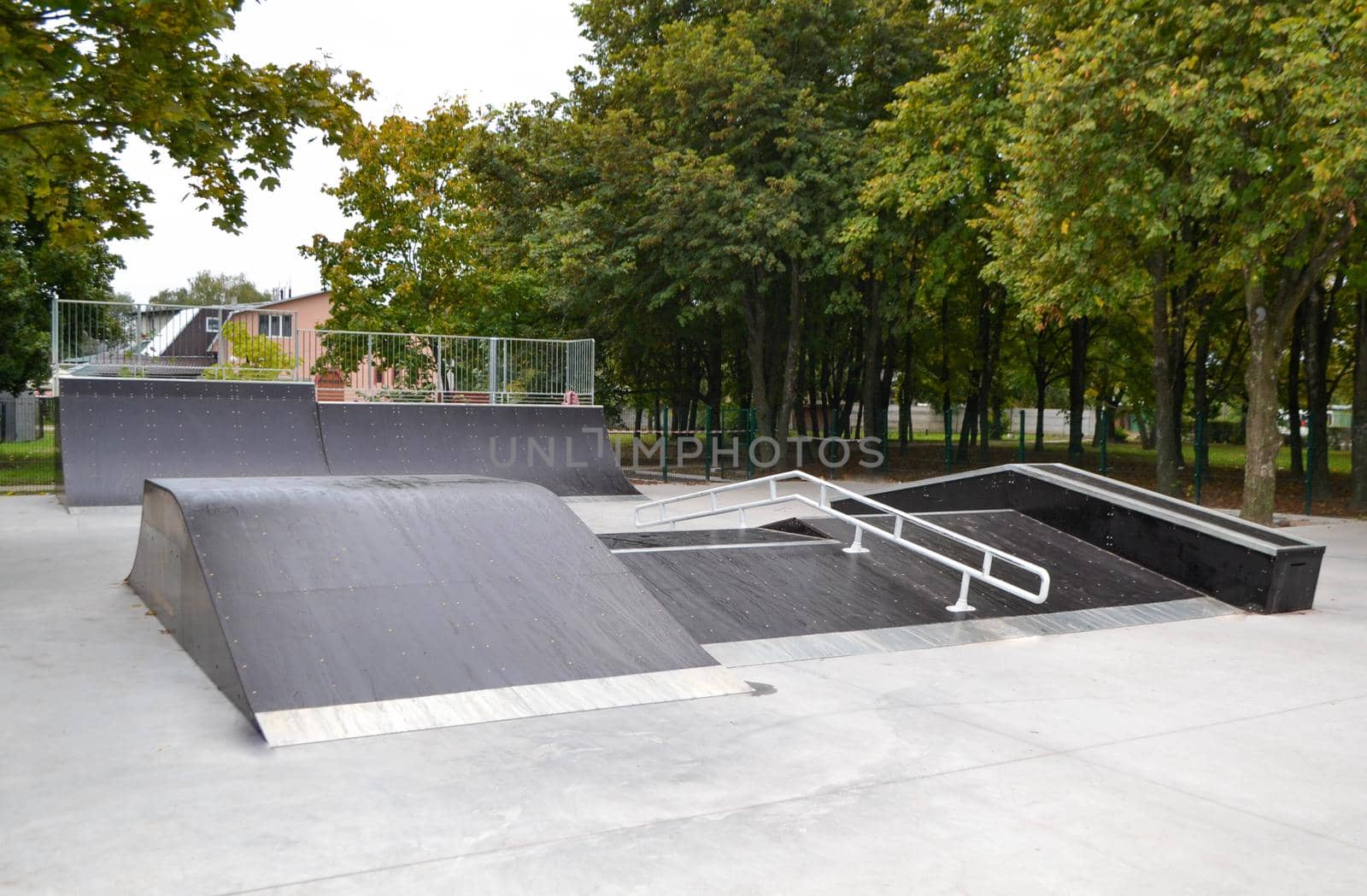 skatepark ramps in the park on autumn by milastokerpro