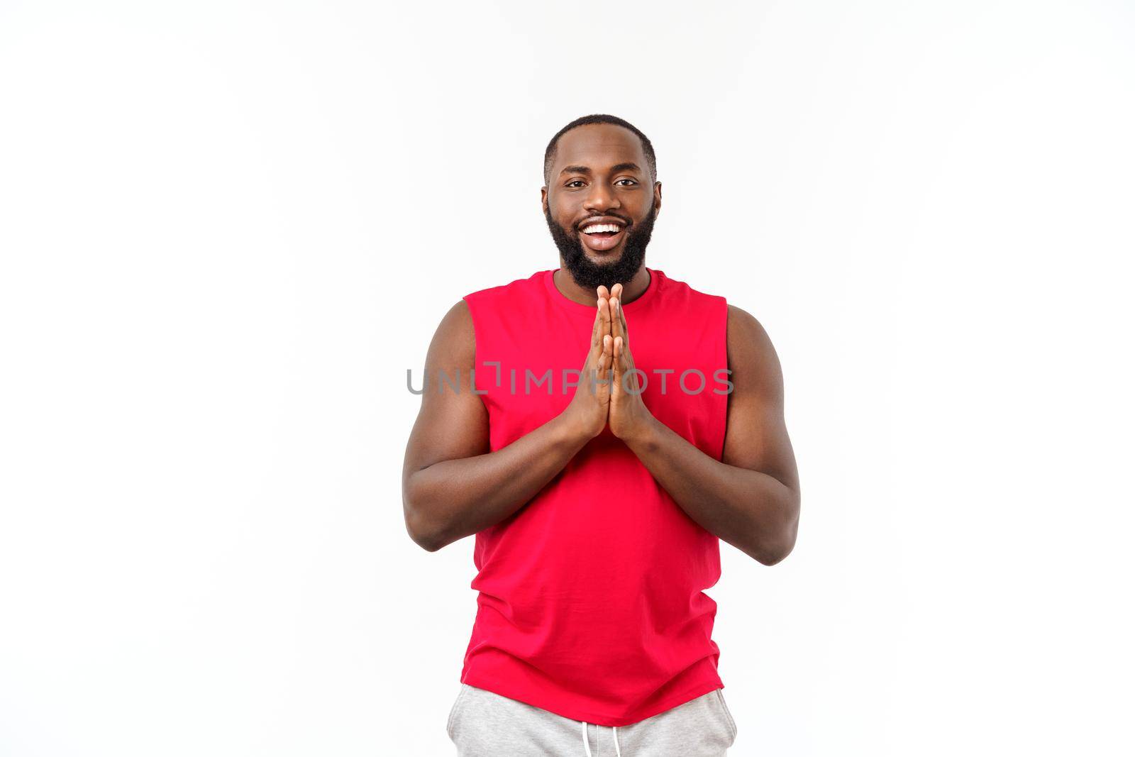 Young sport african american man pleading isolate over grey background