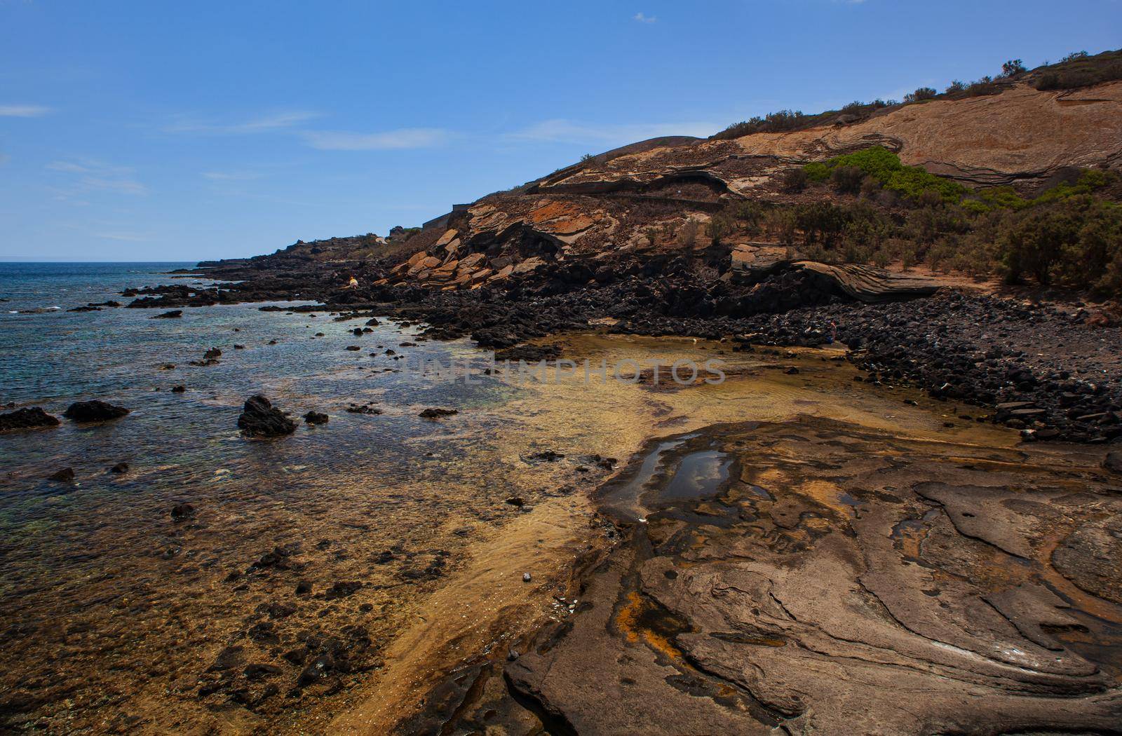 View of the lava beach of Linosa Called Mannarazza, Sicily. Italy