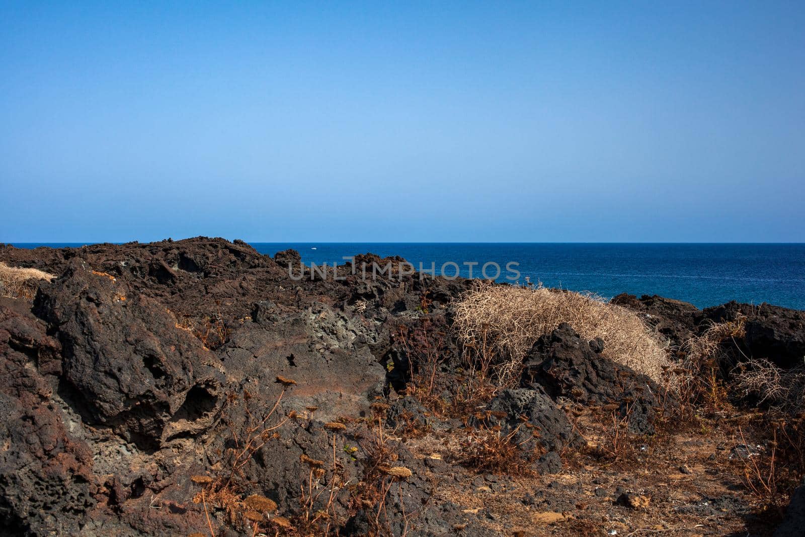 View of the lava beach of Linosa Called Mannarazza, Sicily. Italy