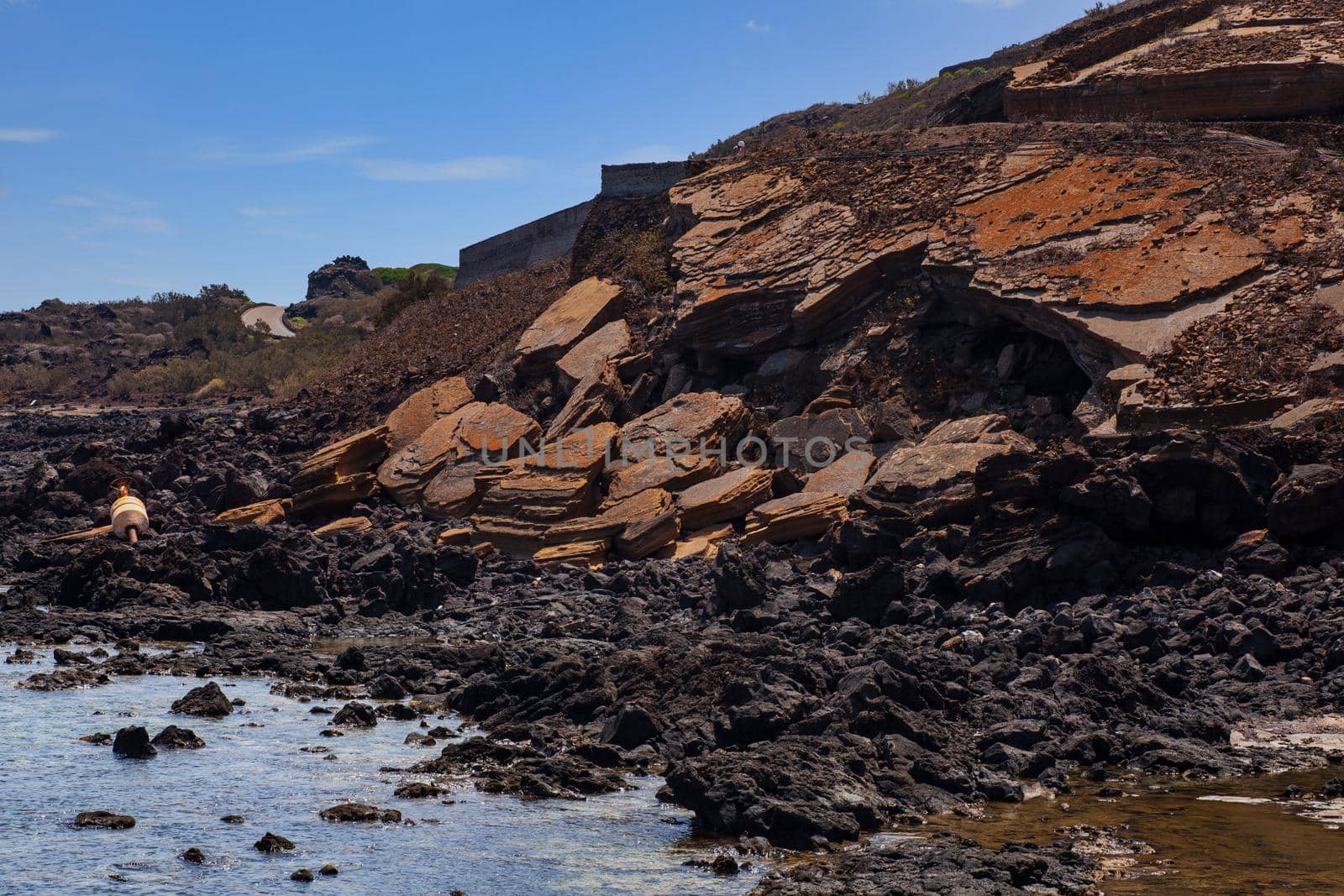 View of the lava beach of Linosa Called Mannarazza, Sicily. Italy