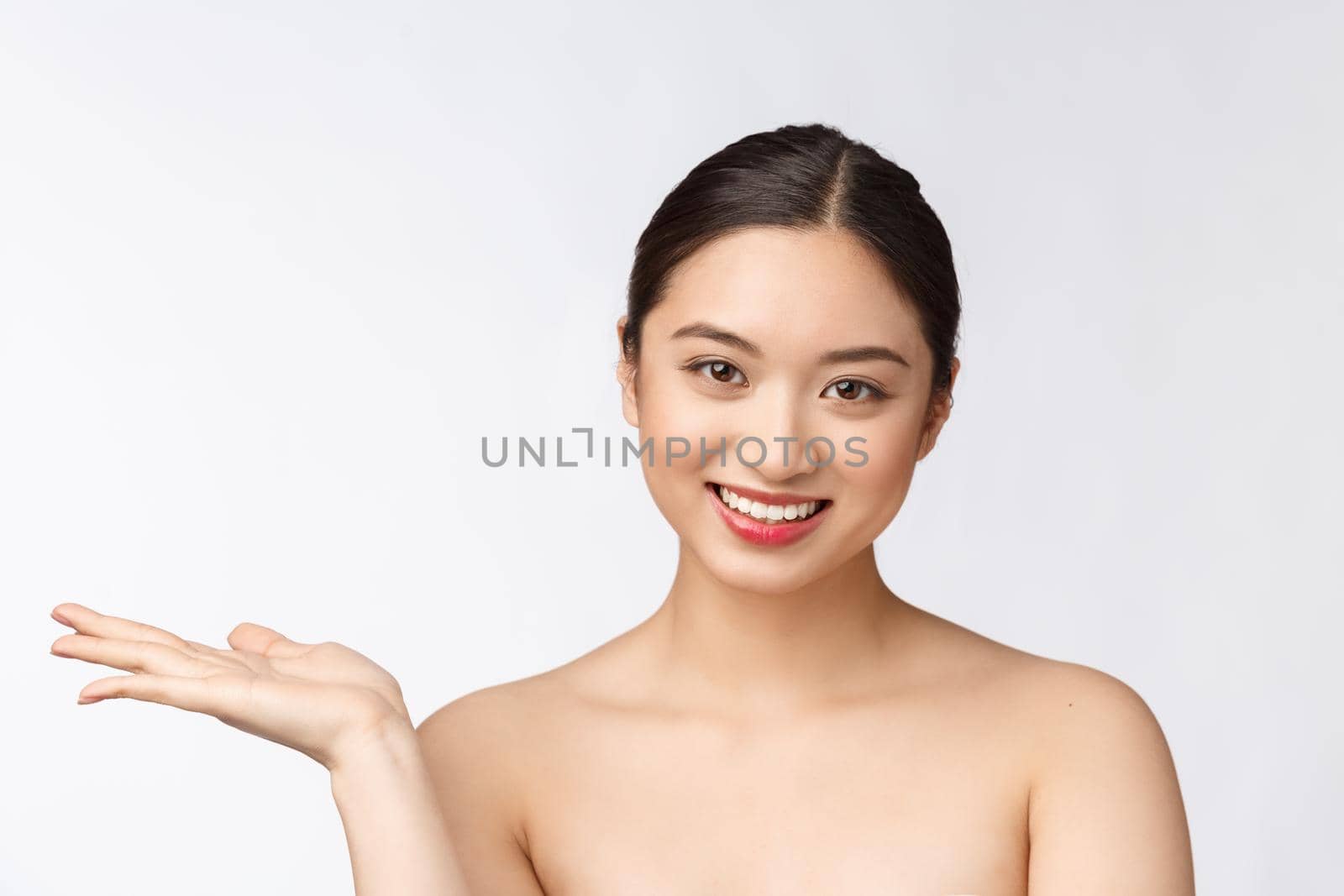 Beautiful smiling woman isolated on white background. Closeup lady portrait looking happy