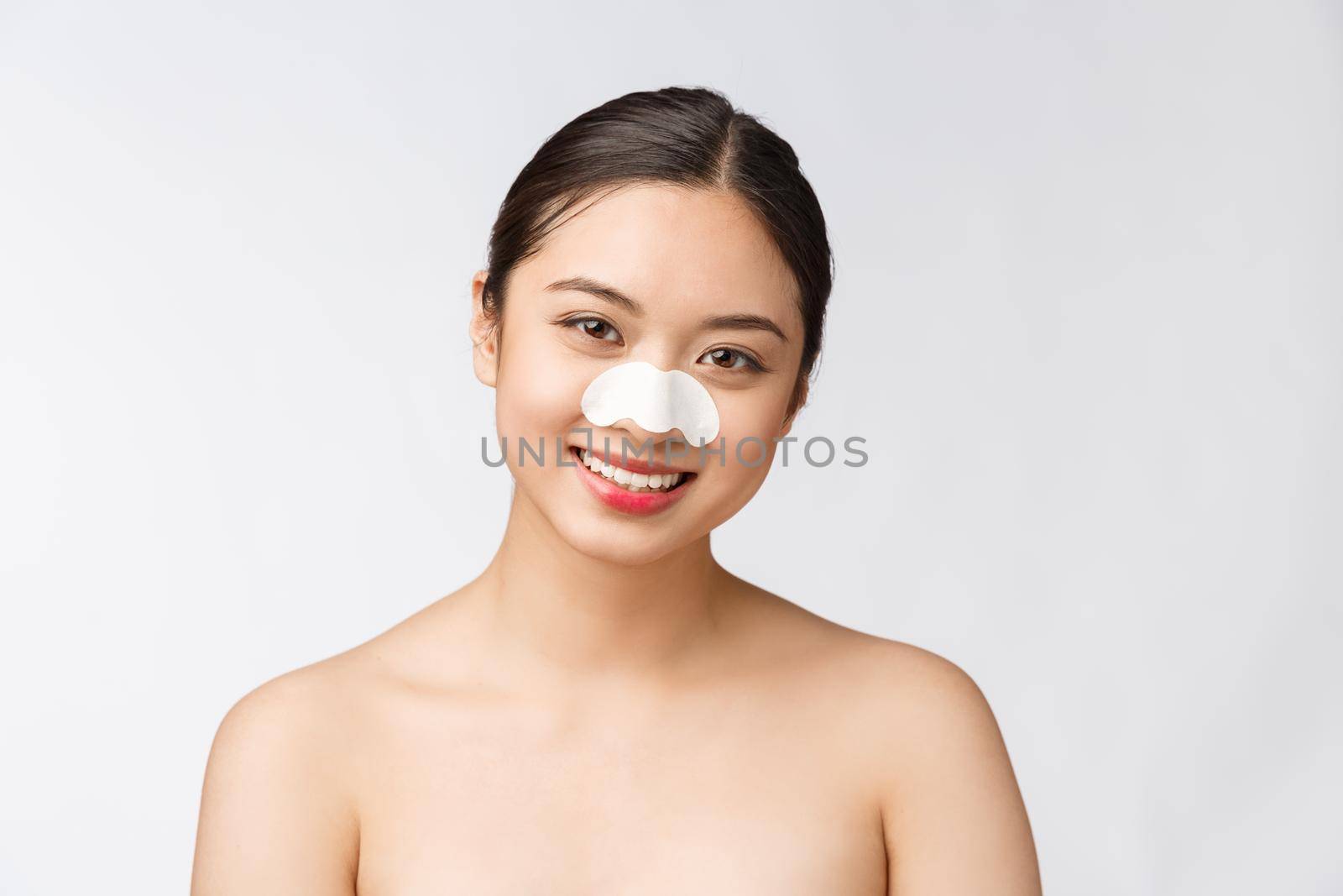 Cosmetology. Portrait Of Beautiful Female Asian Model With Mask On Nose. Closeup Of Healthy Young Woman With Pure Soft Skin And Fresh Natural Makeup