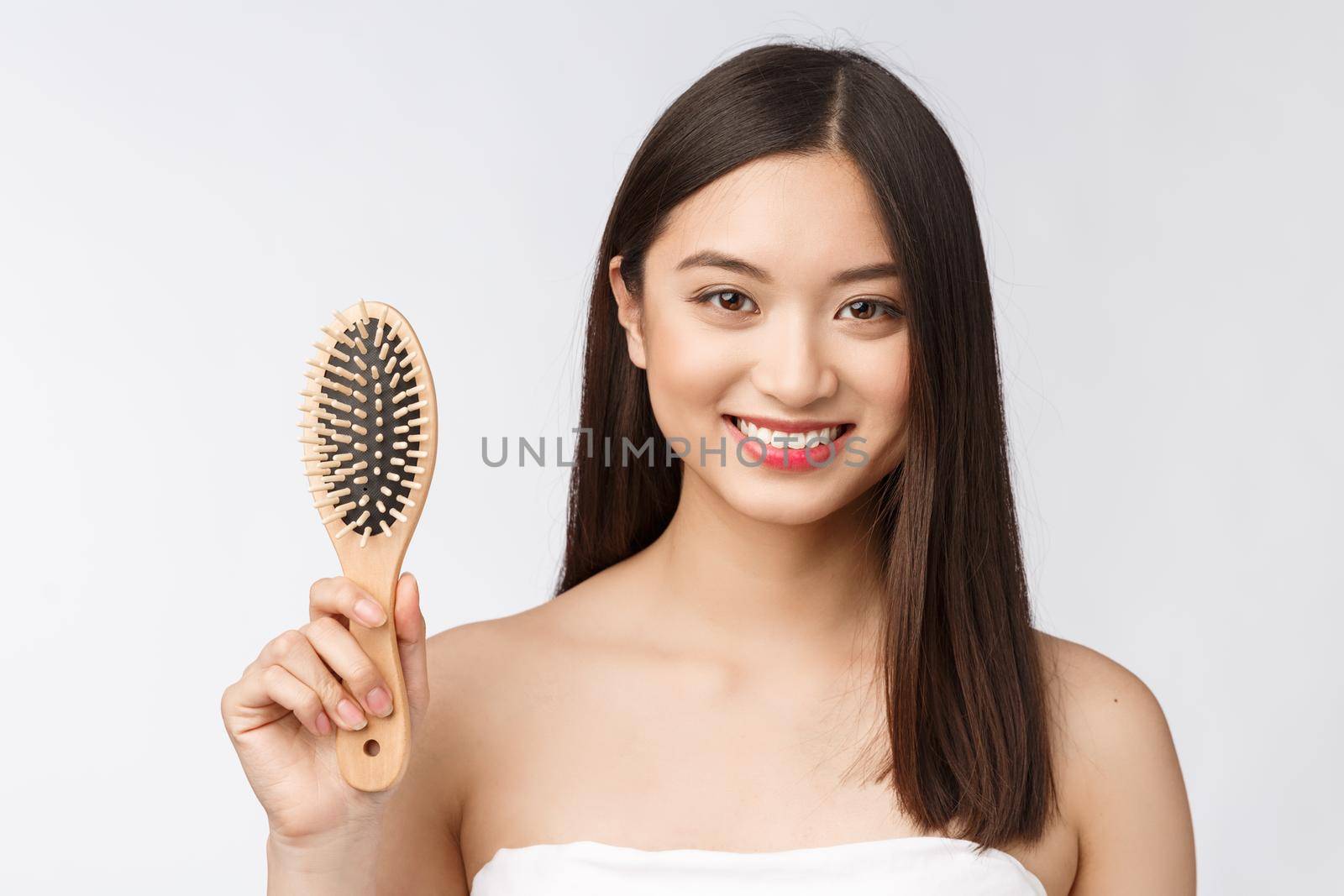 portrait of a beautiful young woman comb wonderful hair isolated on white background, asian beauty by Benzoix