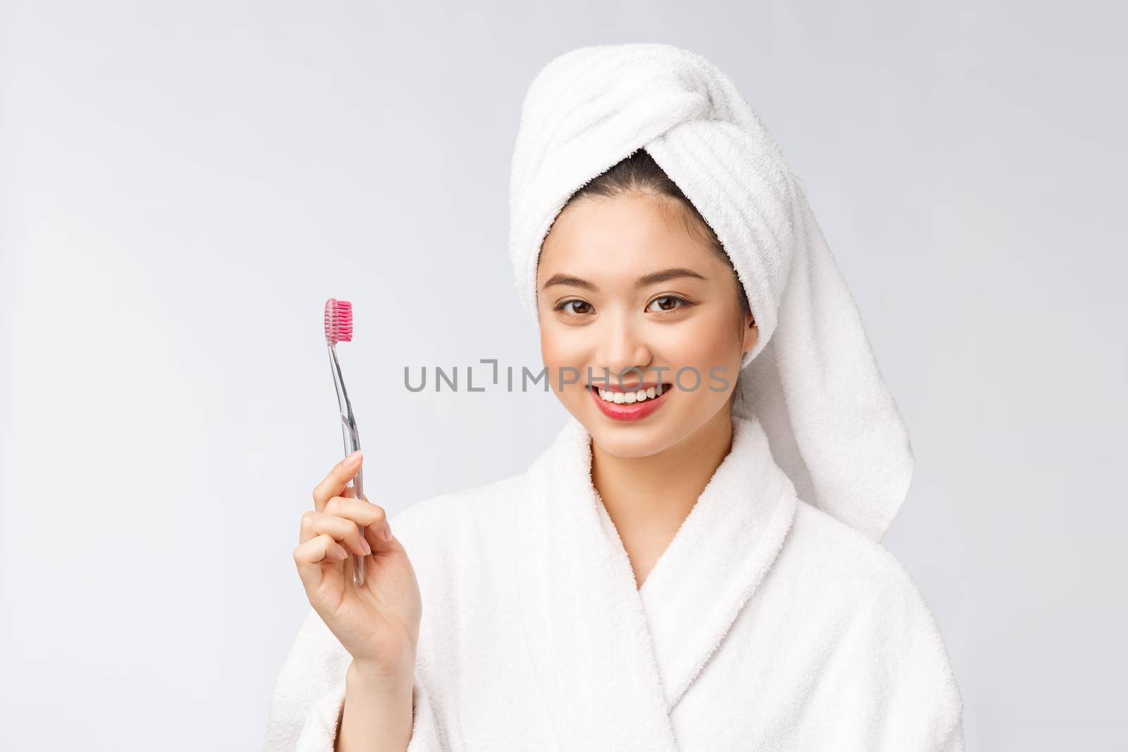 Close up of Smile woman brush teeth. great for health dental care concept, Isolated over white background. asian