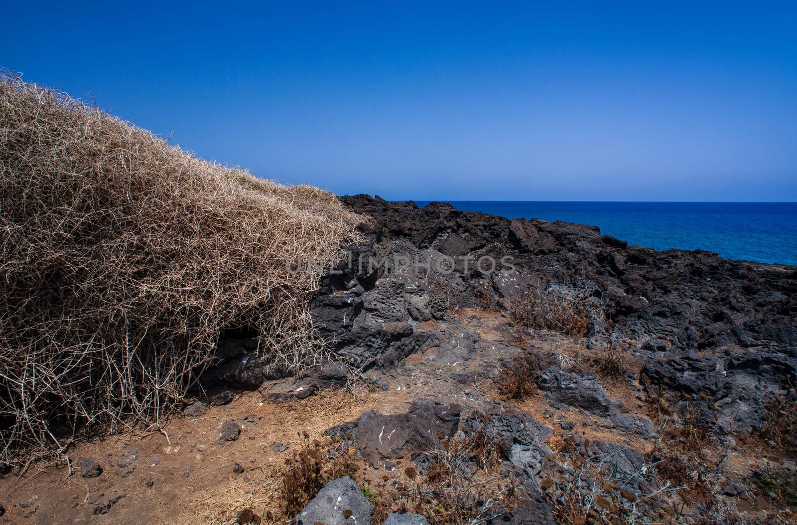 View of the lava beach of Linosa Called Mannarazza, Sicily. Italy
