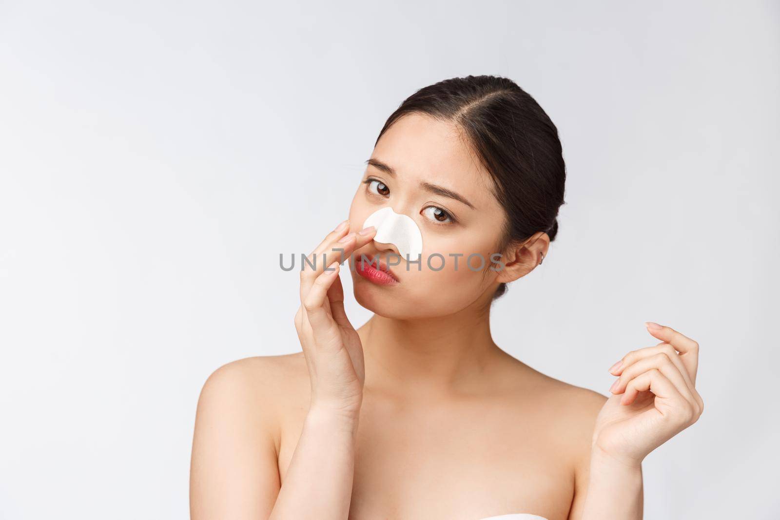 Cosmetology. Portrait Of Beautiful Female Asian Model With Mask On Nose. Closeup Of Healthy Young Woman With Pure Soft Skin And Fresh Natural Makeup