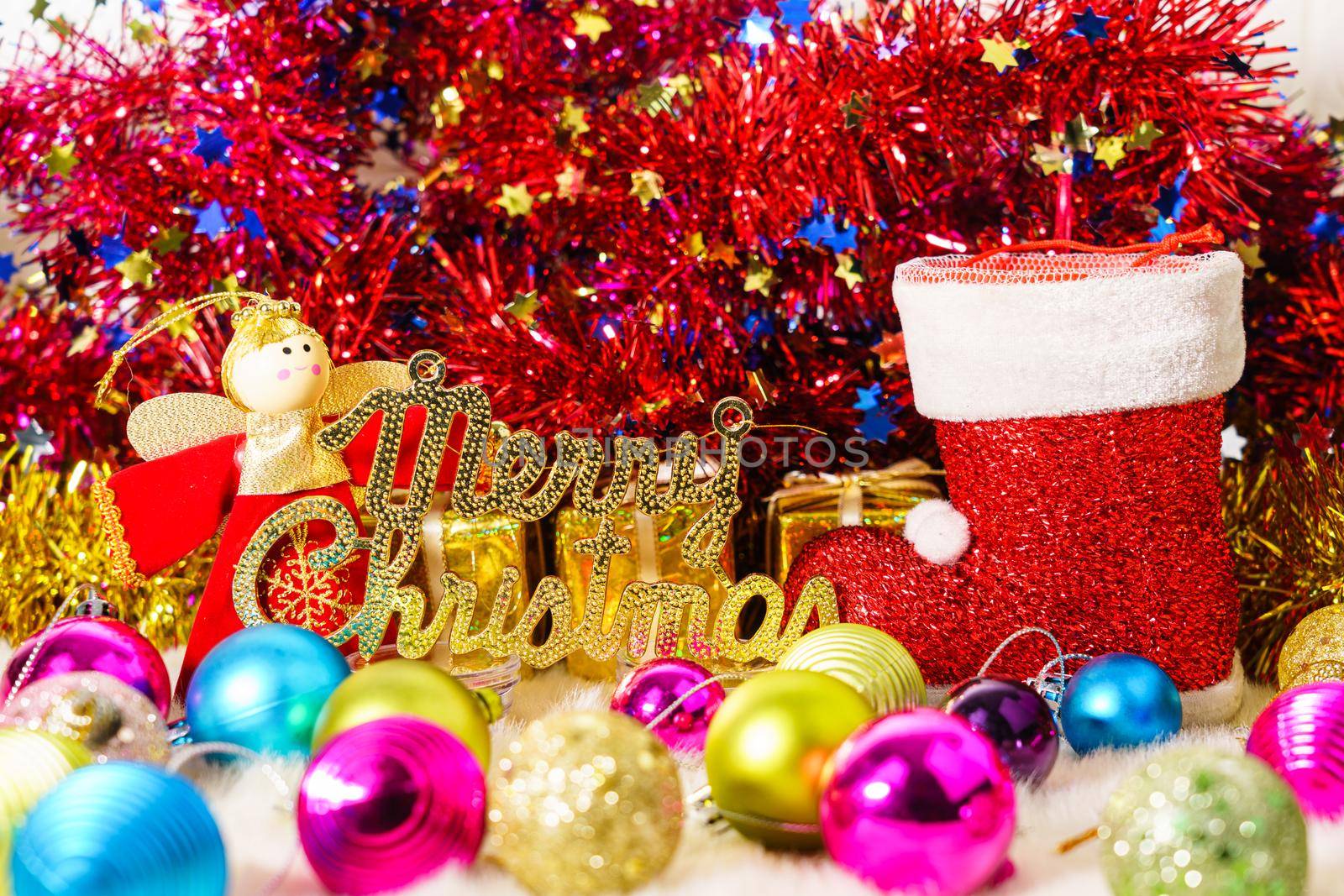 Red Santa claus boot and Christmas ornaments  decorations background