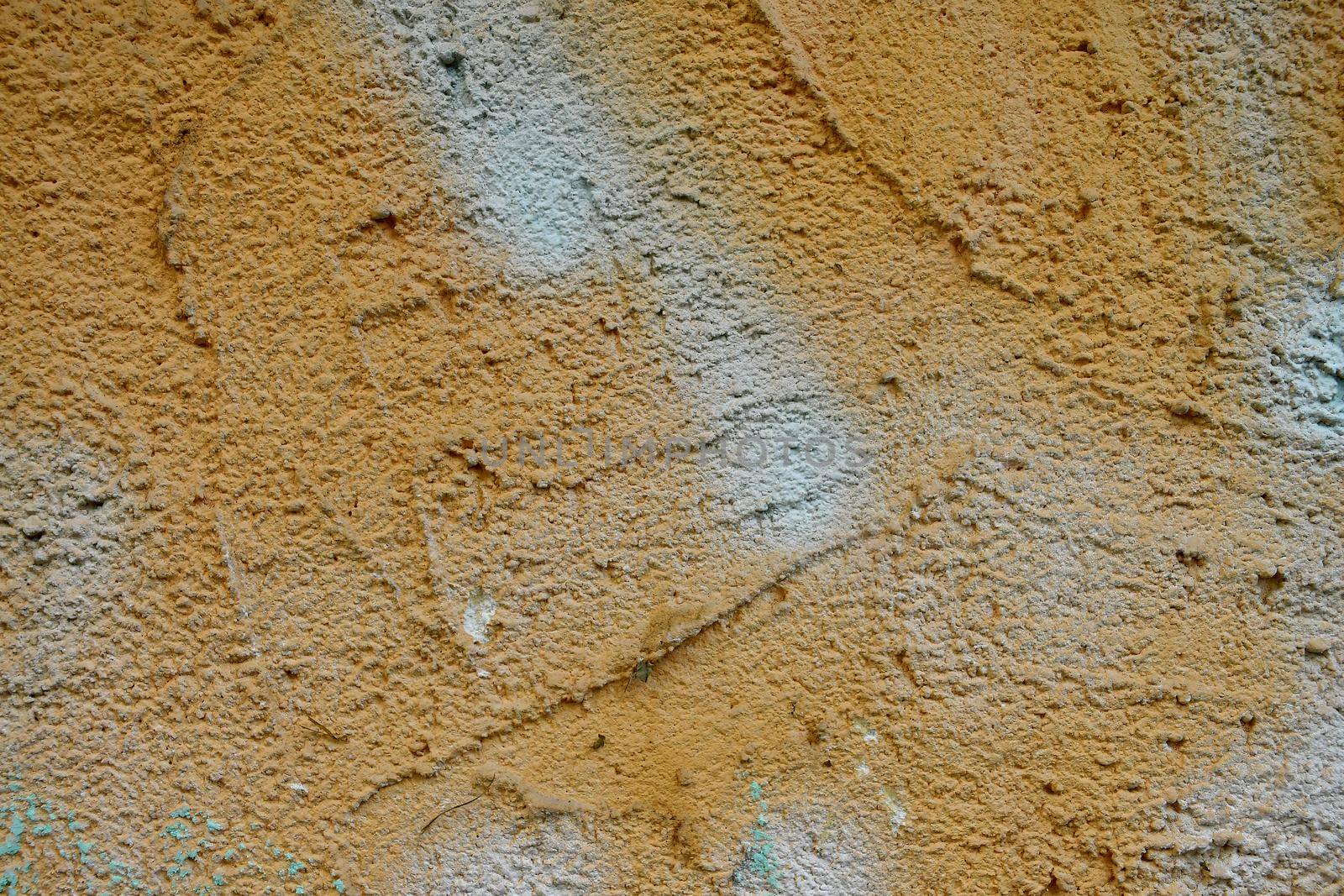 wall of concrete with brown and gray coating