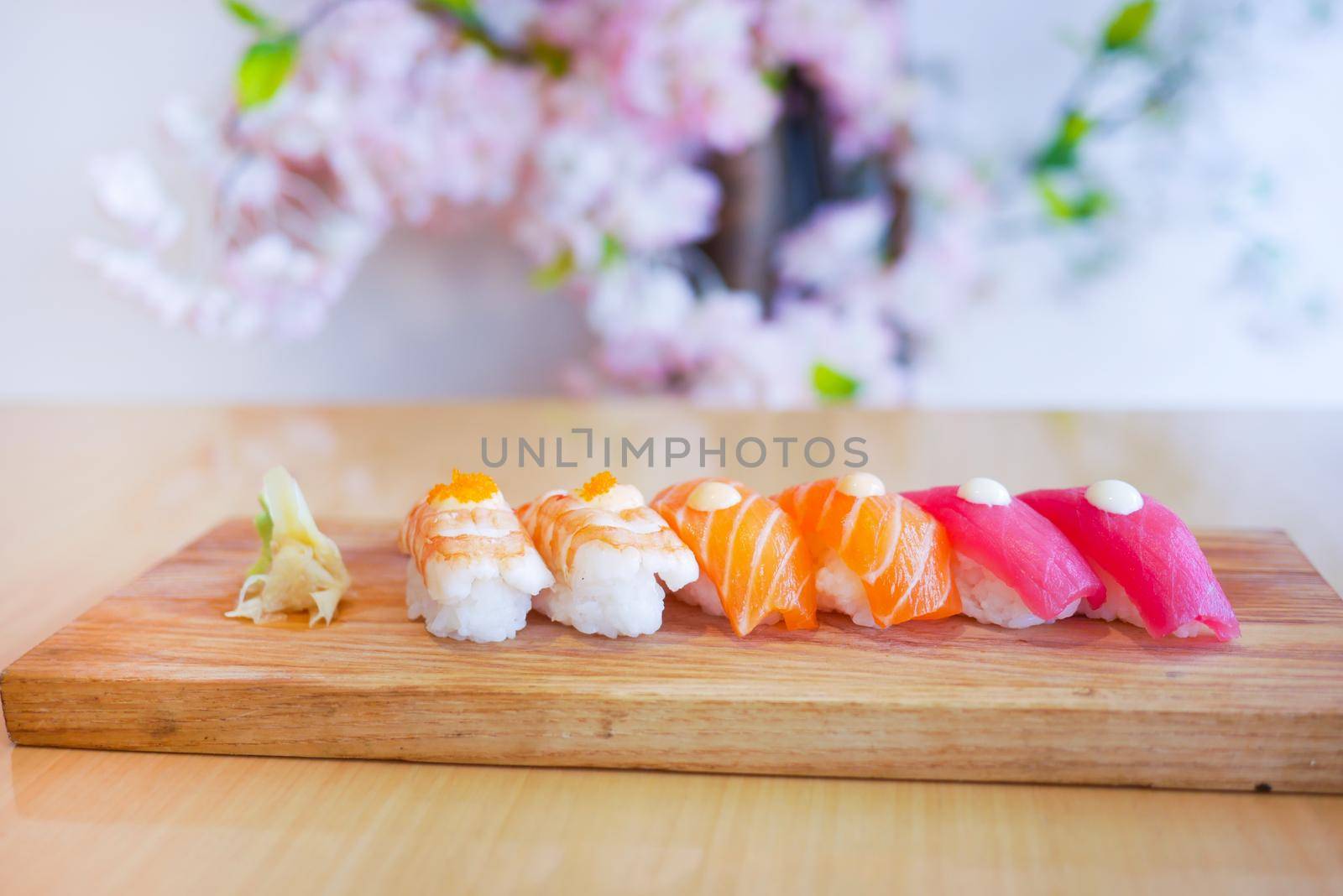 Traditional japanese nigiri sushi with salmon on plate by towfiq007