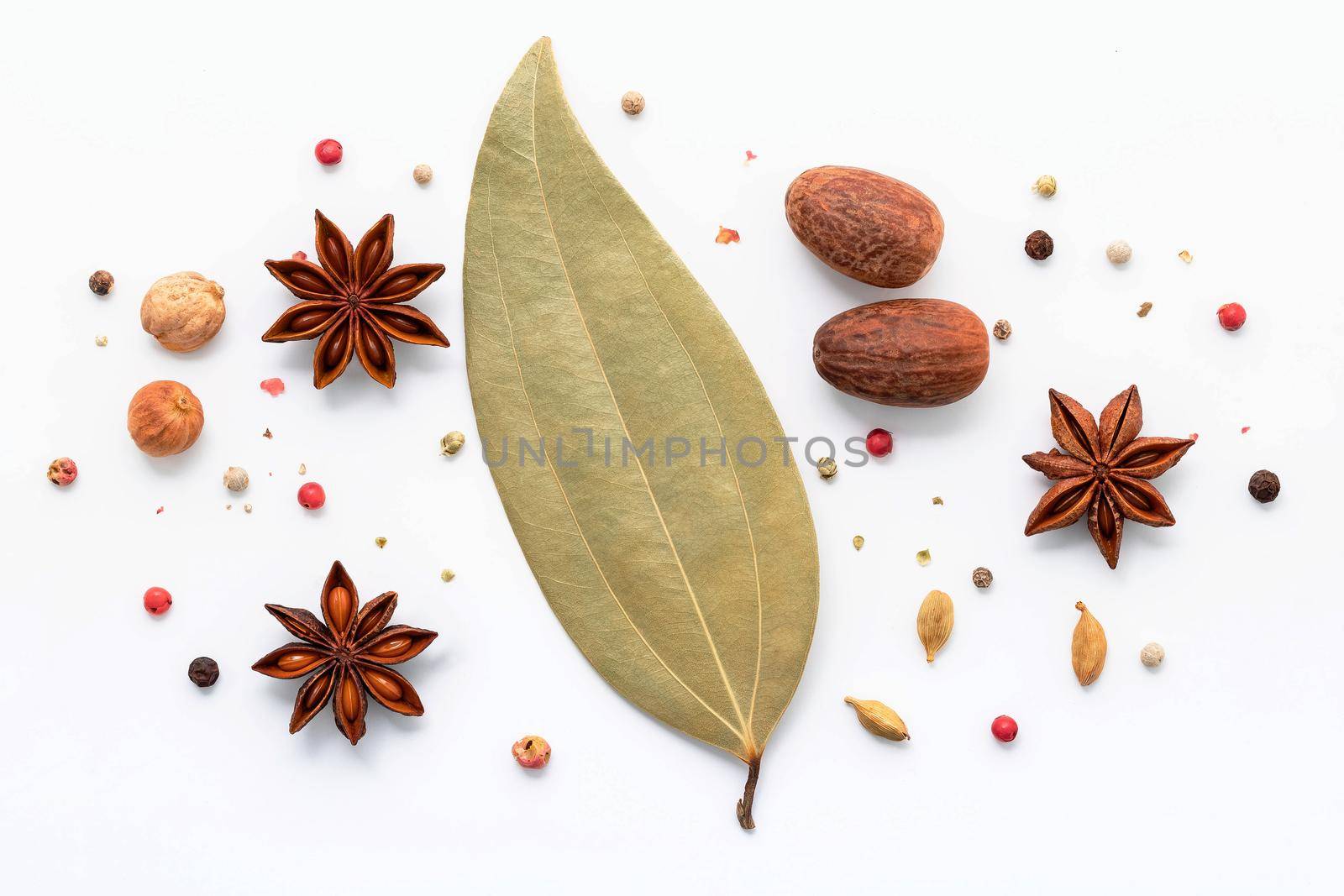 Cinnamon sticks, star anise and spices isolated on white background. by kerdkanno