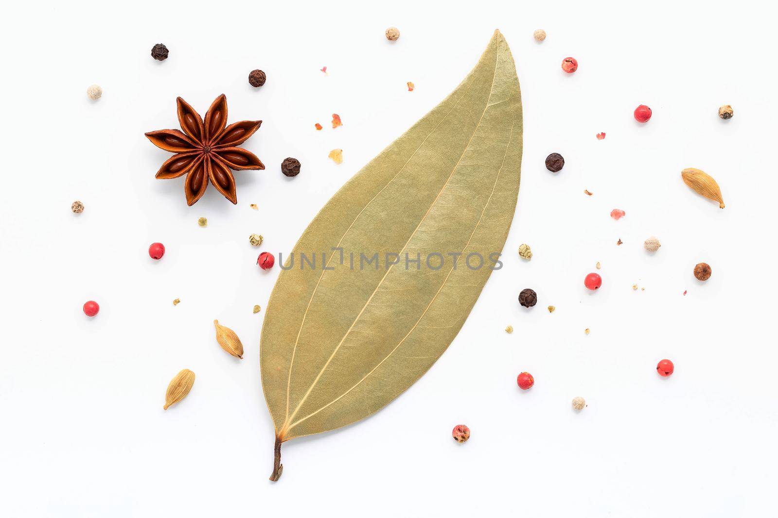 Cinnamon sticks, star anise and spices isolated on white background. by kerdkanno