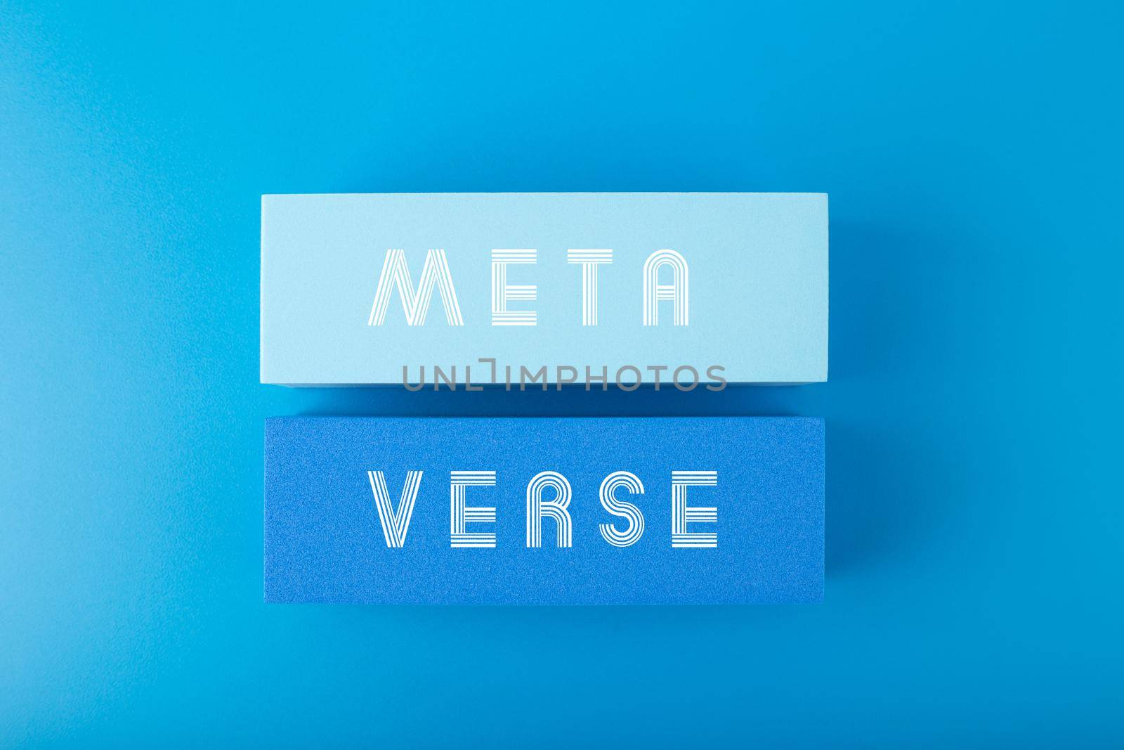 Metaverse modern minimal concept in blue colors. Written metaverse single word on blue rectangles against blue background. Future technologies. 