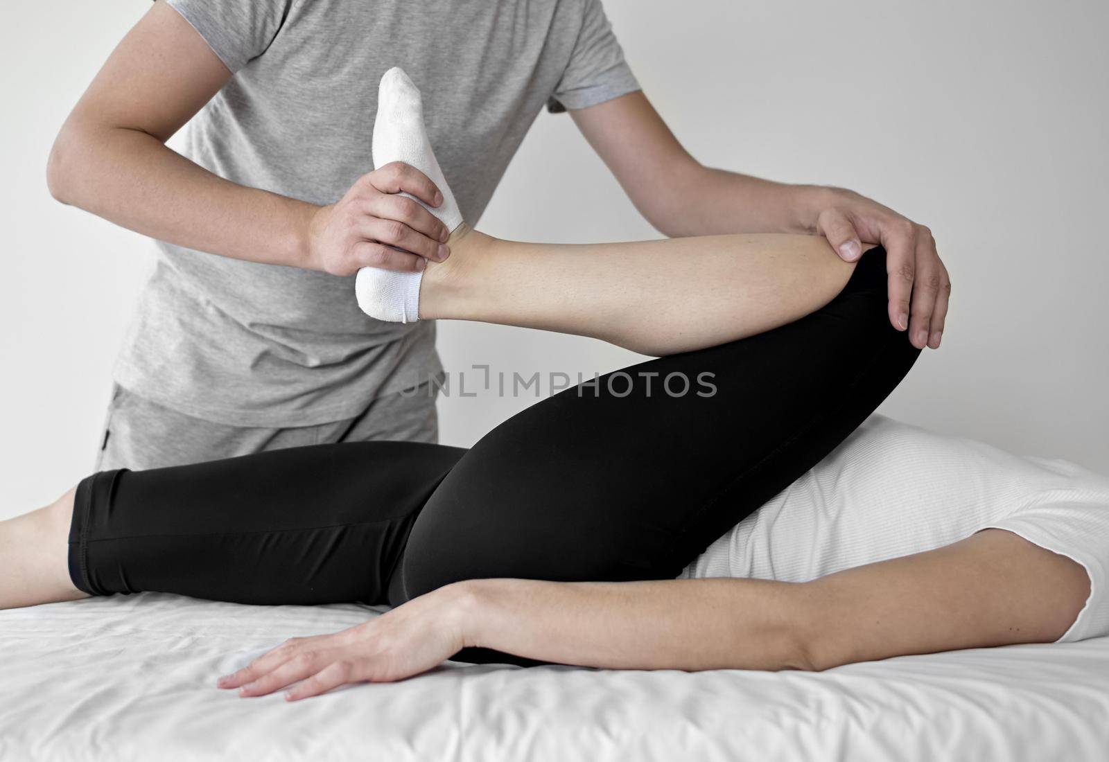 therapist undergoing physical therapy with female patient. Resolution and high quality beautiful photo