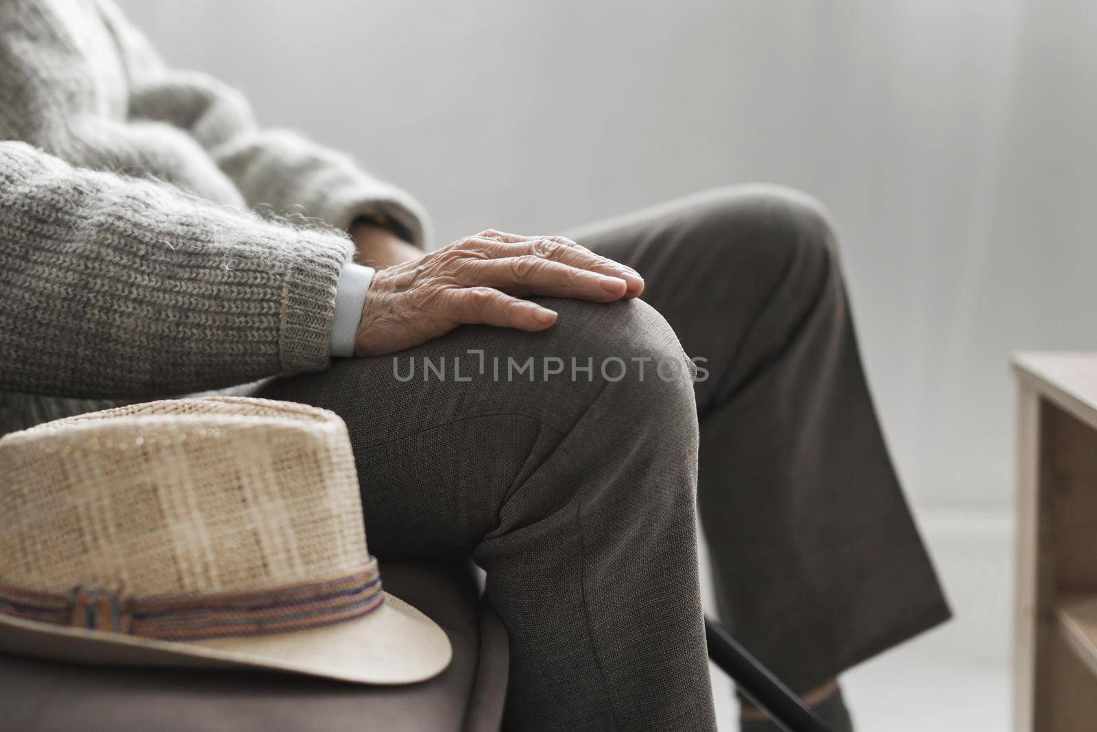 side view man with his hat nursing home. High quality beautiful photo concept by Zahard