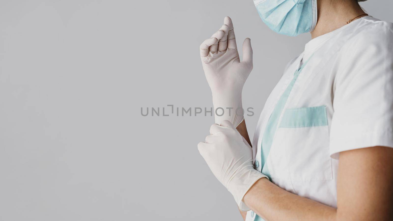 doctor putting surgical gloves with copy space. Resolution and high quality beautiful photo