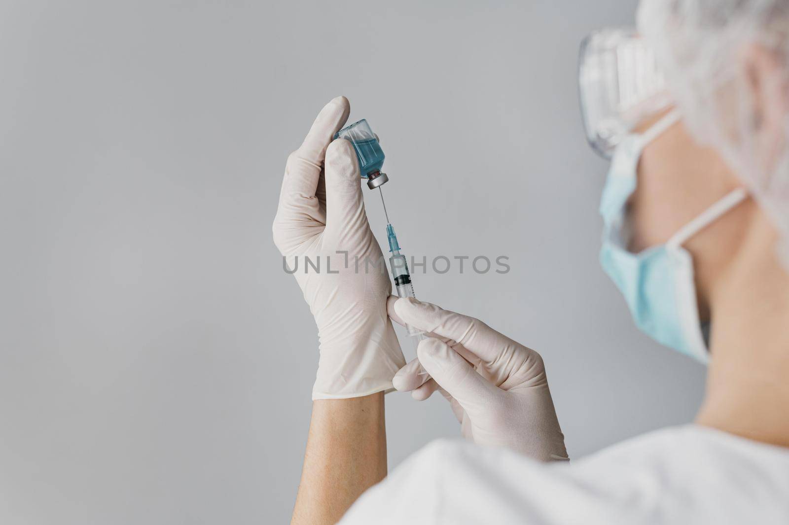 doctor holding syringe vaccine. High quality beautiful photo concept by Zahard