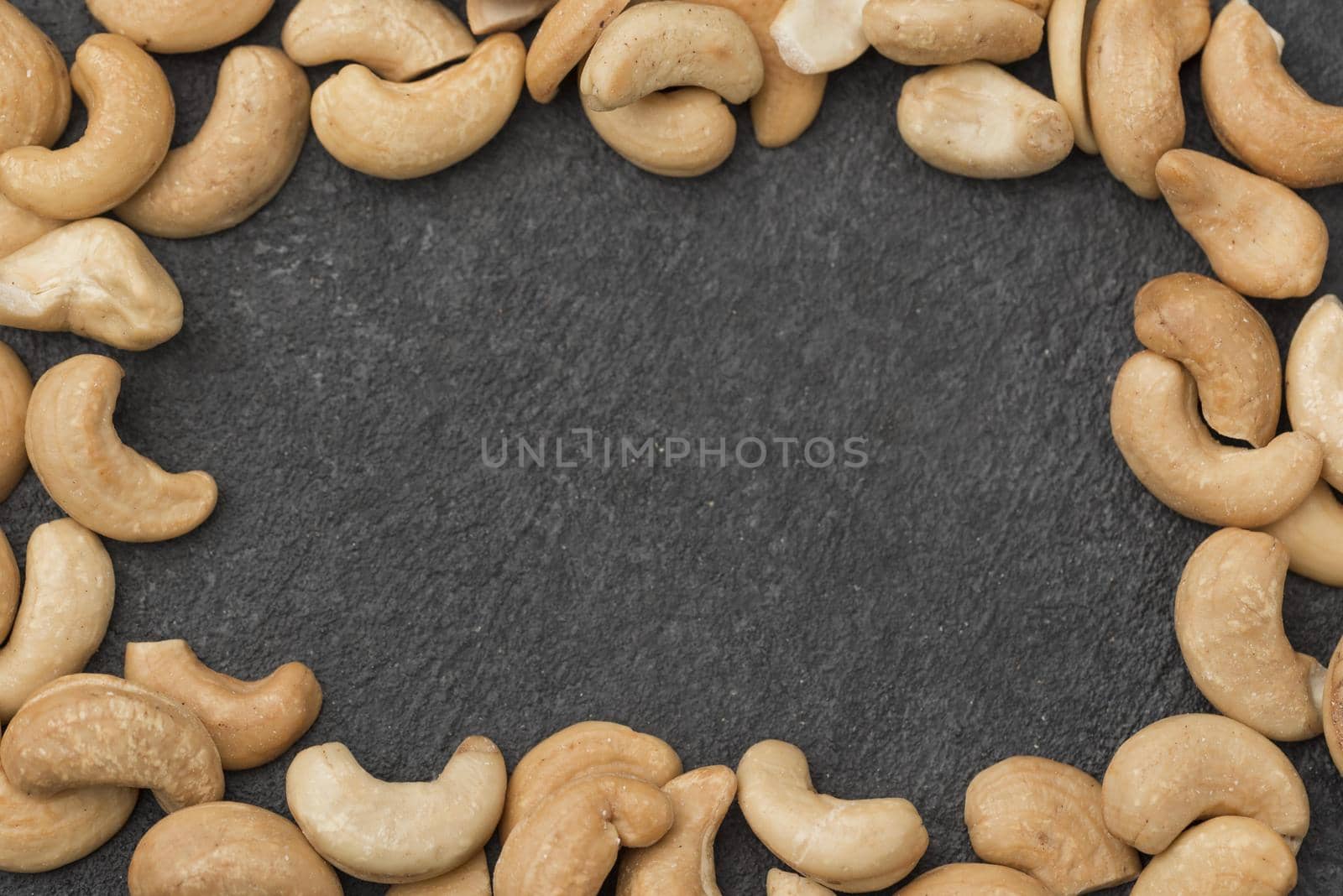 healthy raw cashew nuts frame. High quality beautiful photo concept by Zahard