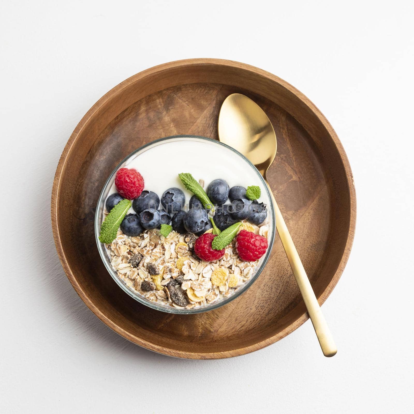 top view oatmeal bowl with raspberries blueberries2. High quality beautiful photo concept by Zahard