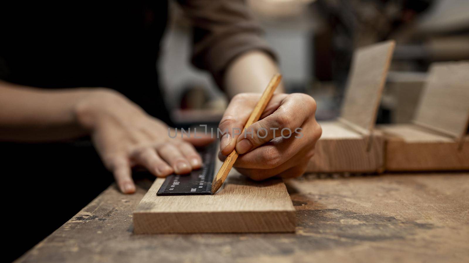 female carpenter working studio with pencil. High quality beautiful photo concept by Zahard