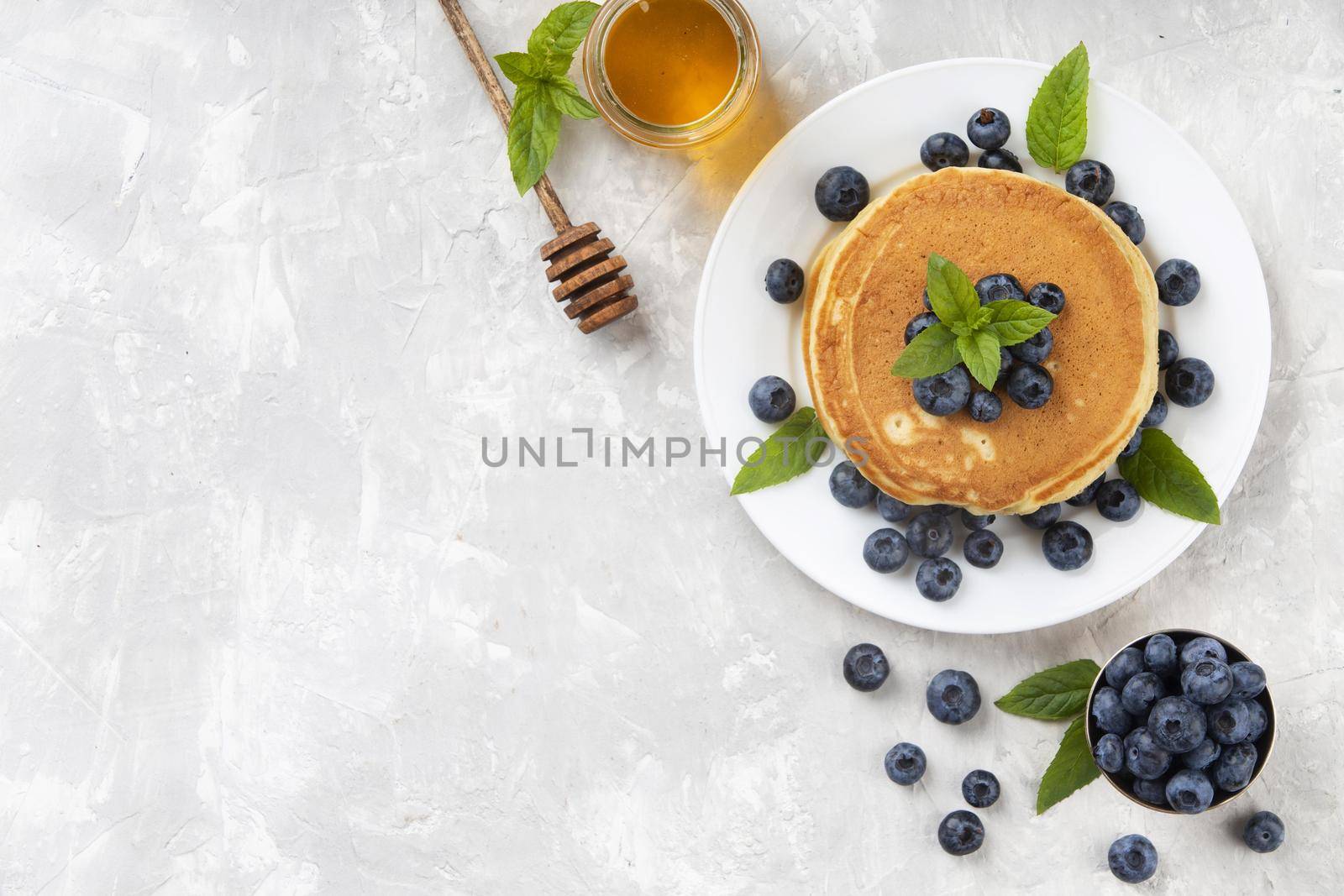 top view sweet pancakes composition with copy space. High quality beautiful photo concept by Zahard