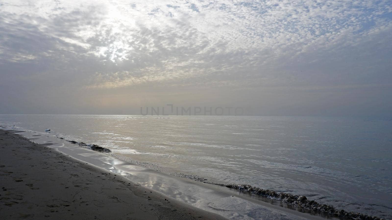 Dawn on the sandy beach of the sea. Sand dune. by Passcal